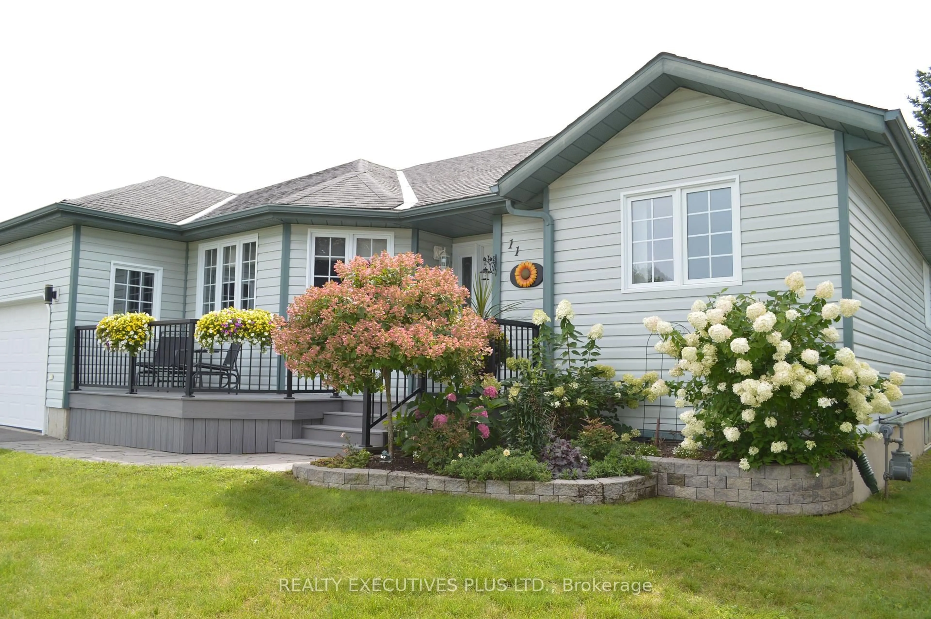 Home with vinyl exterior material, street for 11 Grove St, South Dundas Ontario L8N 1P4