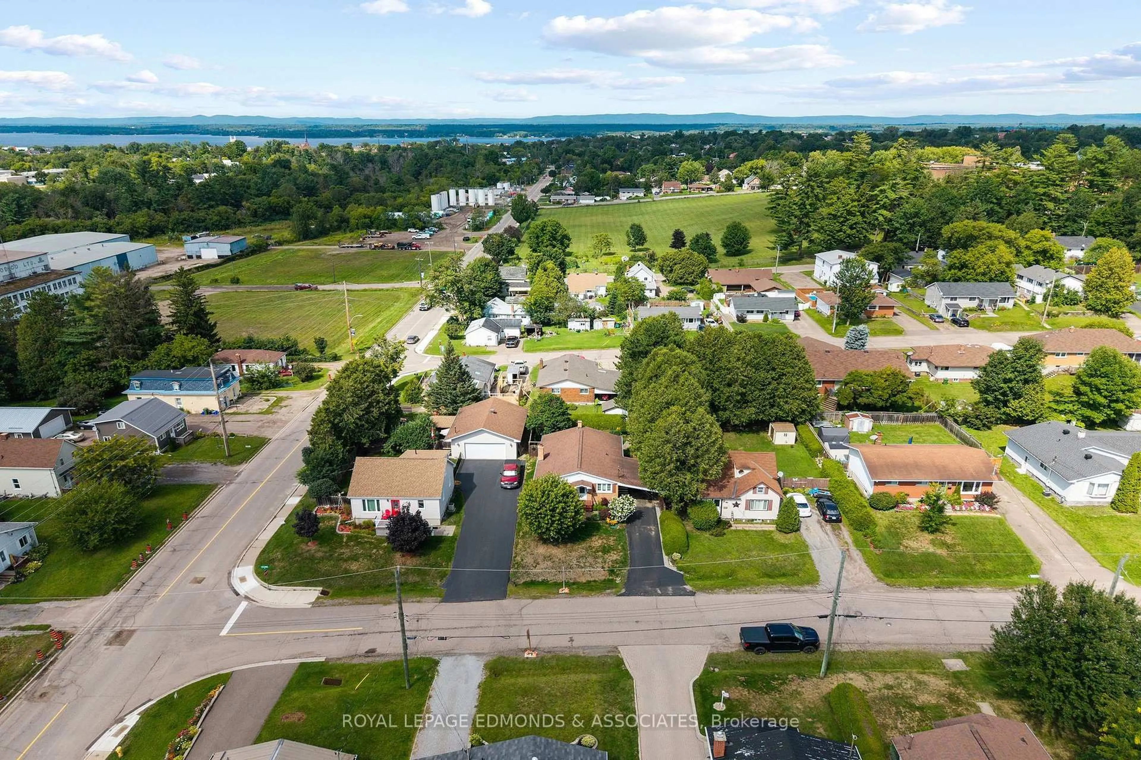 A pic from outside/outdoor area/front of a property/back of a property/a pic from drone, water/lake/river/ocean view for 105 Ellis Ave, Pembroke Ontario K8A 2H7