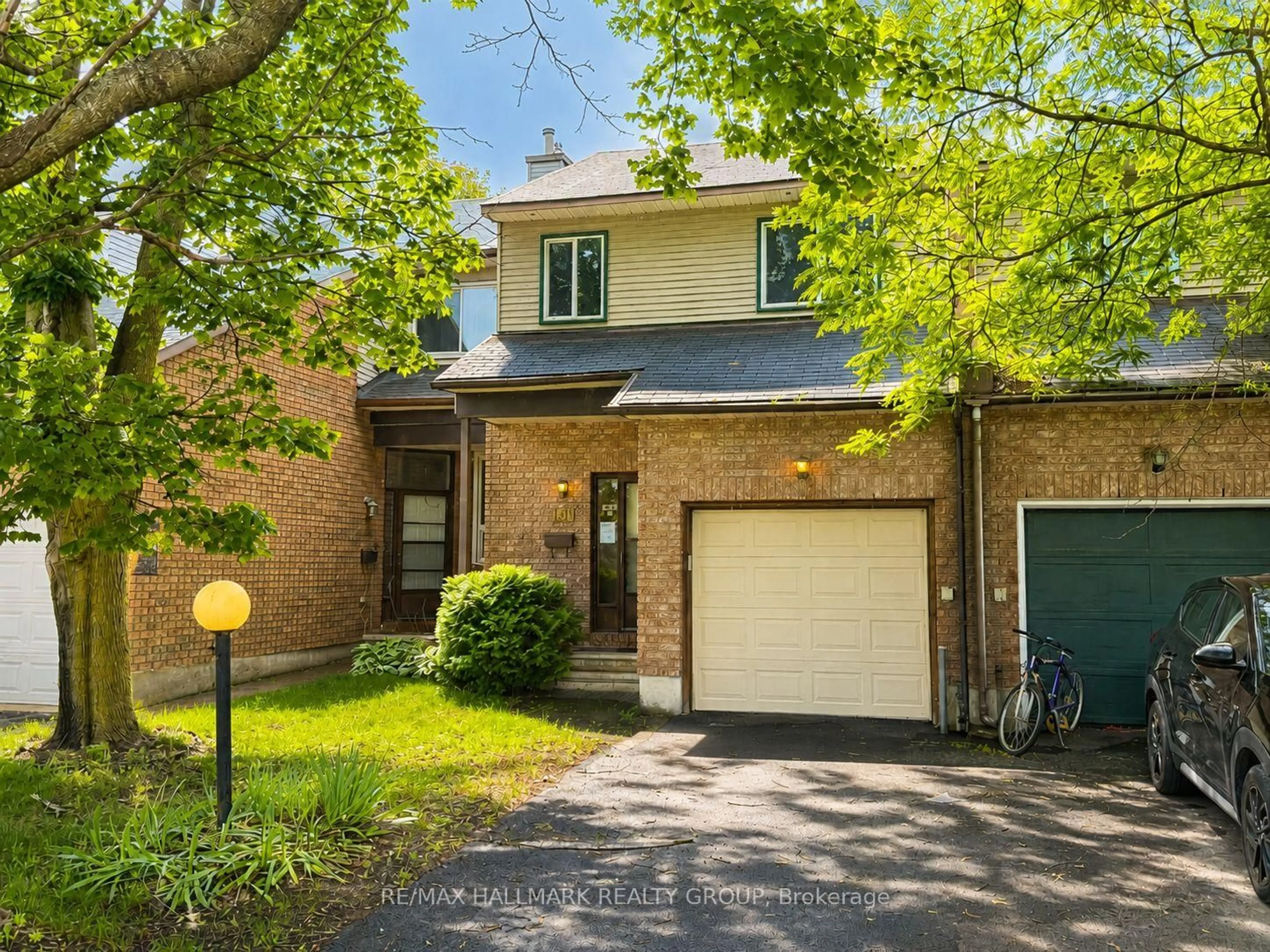 Home with brick exterior material, street for 181 Tartan Dr, Barrhaven Ontario K2J 3S2
