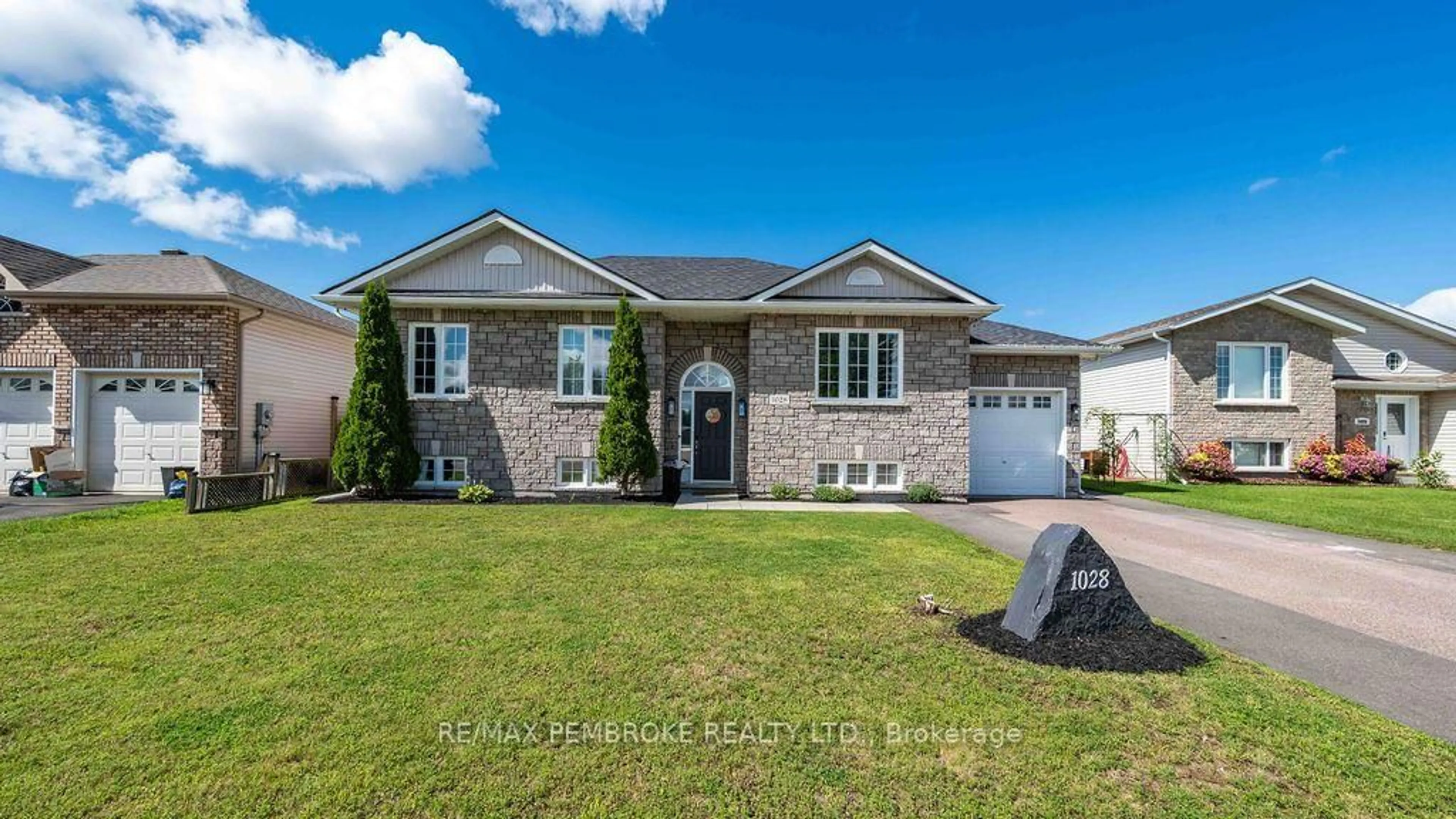 Home with brick exterior material, street for 1028 Limestone Tr, Petawawa Ontario K8H 0A6