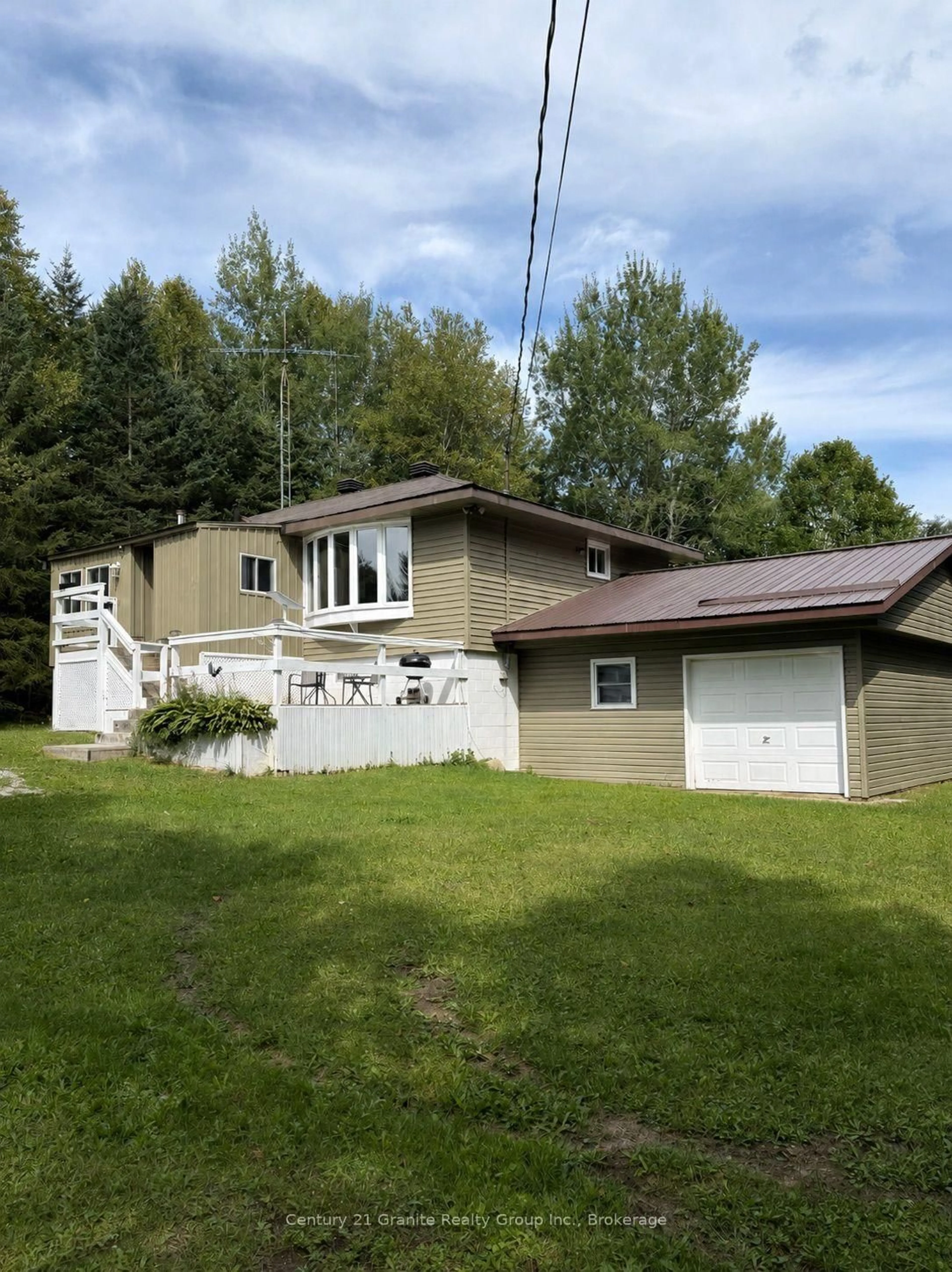 A pic from outside/outdoor area/front of a property/back of a property/a pic from drone, unknown for 33333 Hwy 62 Highway, Maynooth Ontario K0L 2S0