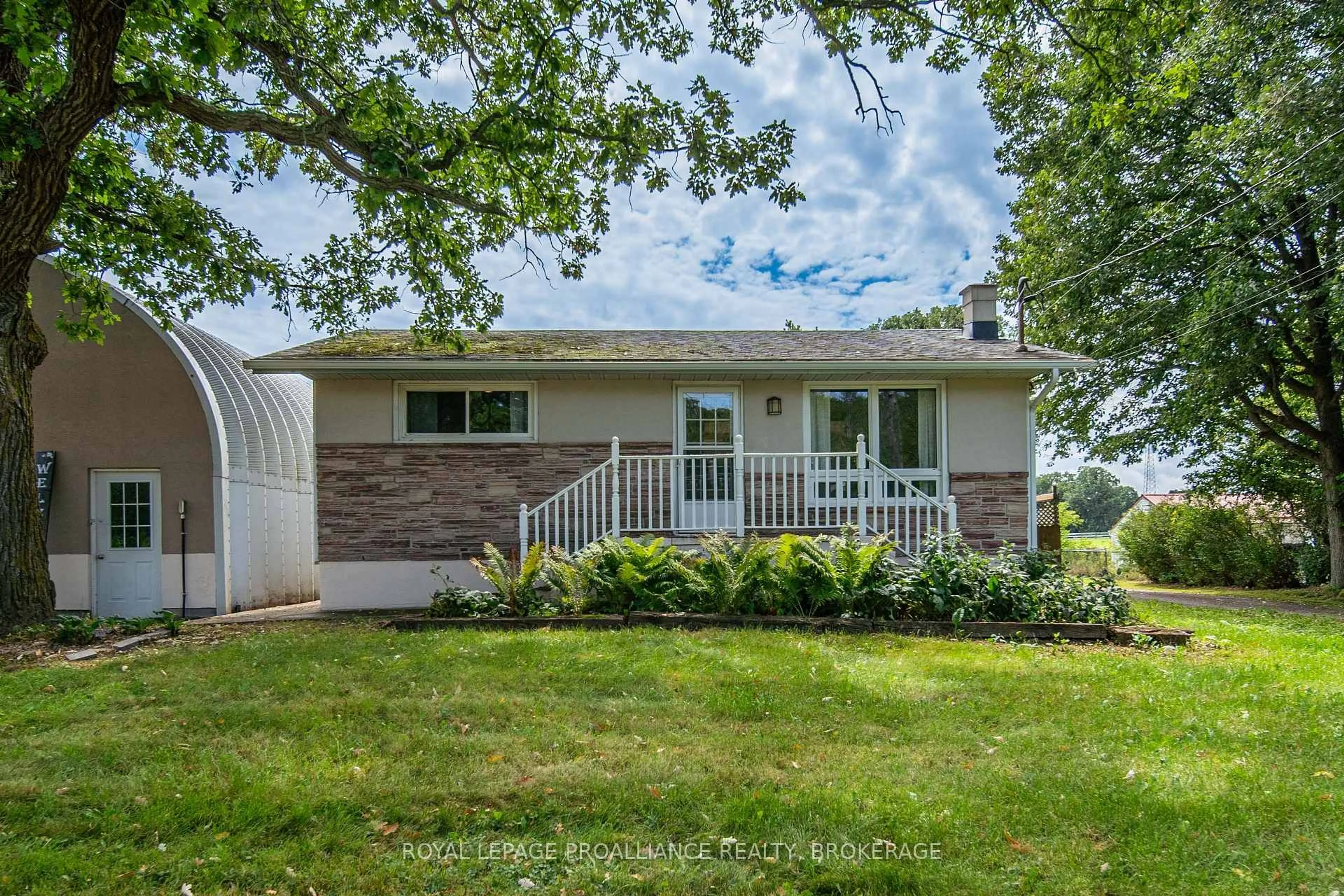 Home with vinyl exterior material, street for 1911 Unity Rd, Mcdonalds Corners Ontario K0H 1M0