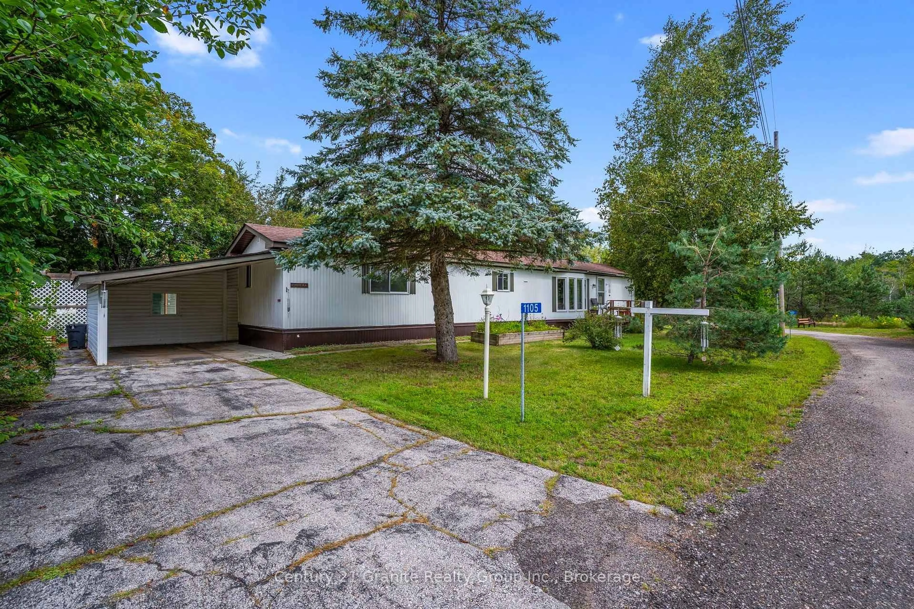 A pic from outside/outdoor area/front of a property/back of a property/a pic from drone, street for 1105 Eighth Lane, Minden Hills Ontario K0M 2K0