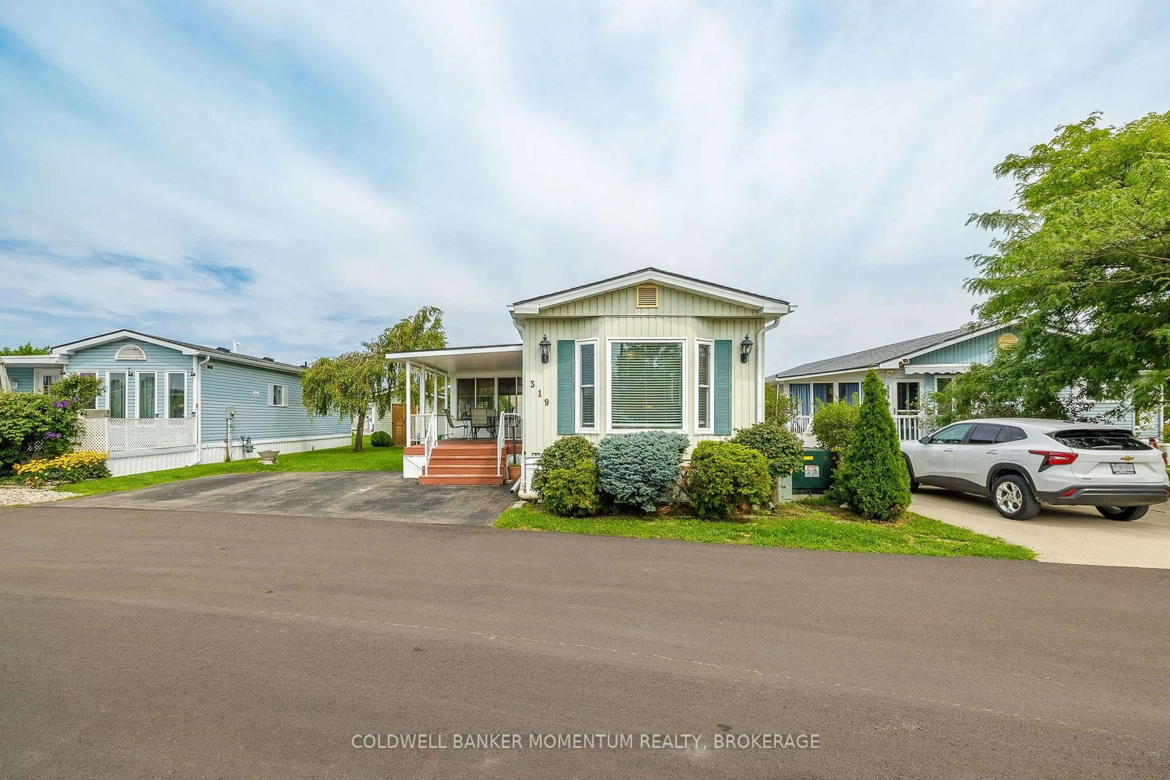 Home with vinyl exterior material, street for 3033 Townline Rd #319, Fort Erie Ontario L0S 1S1