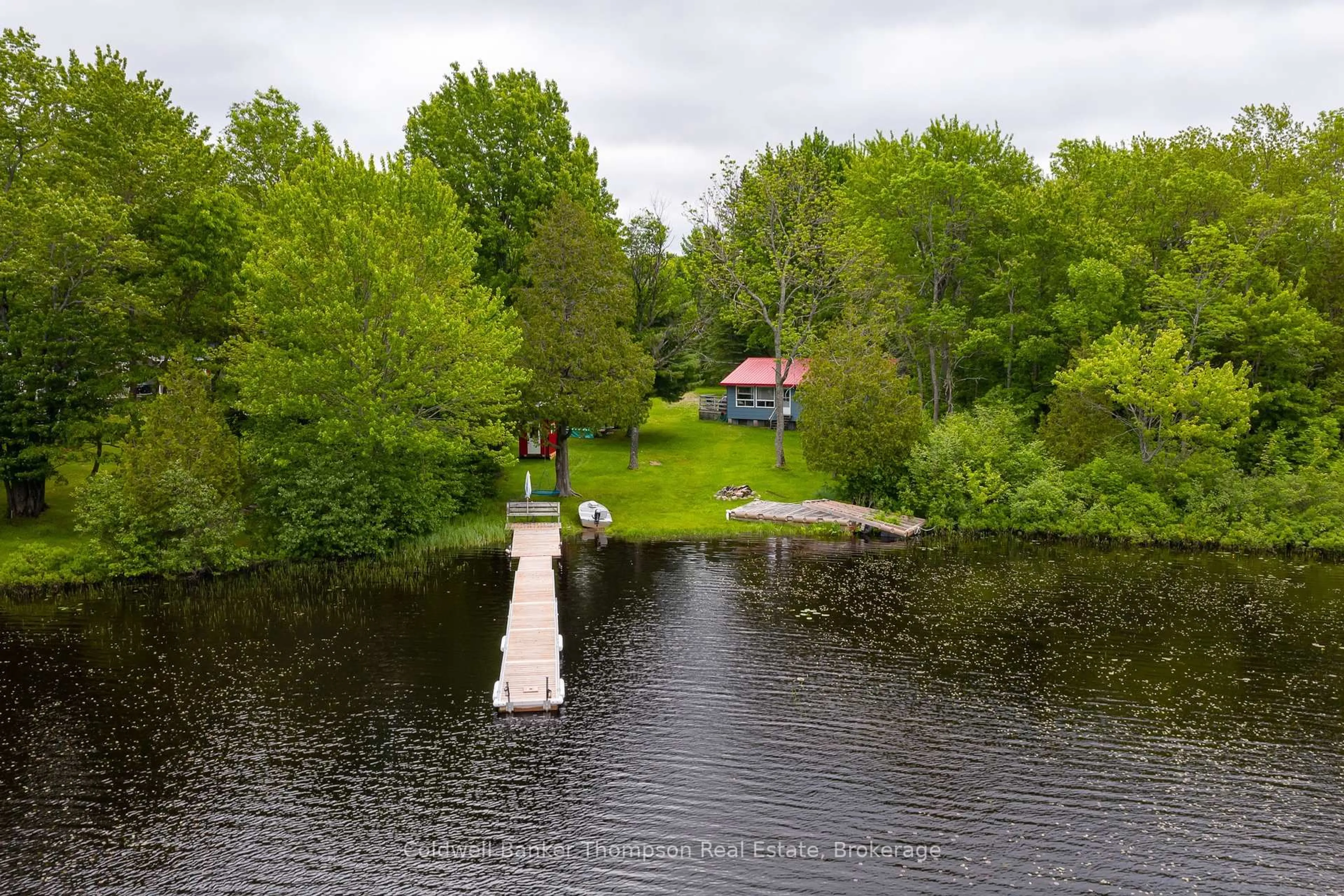 A pic from outside/outdoor area/front of a property/back of a property/a pic from drone, water/lake/river/ocean view for 432 Lakeside Tr, Magnetawan Ontario P0A 1P0
