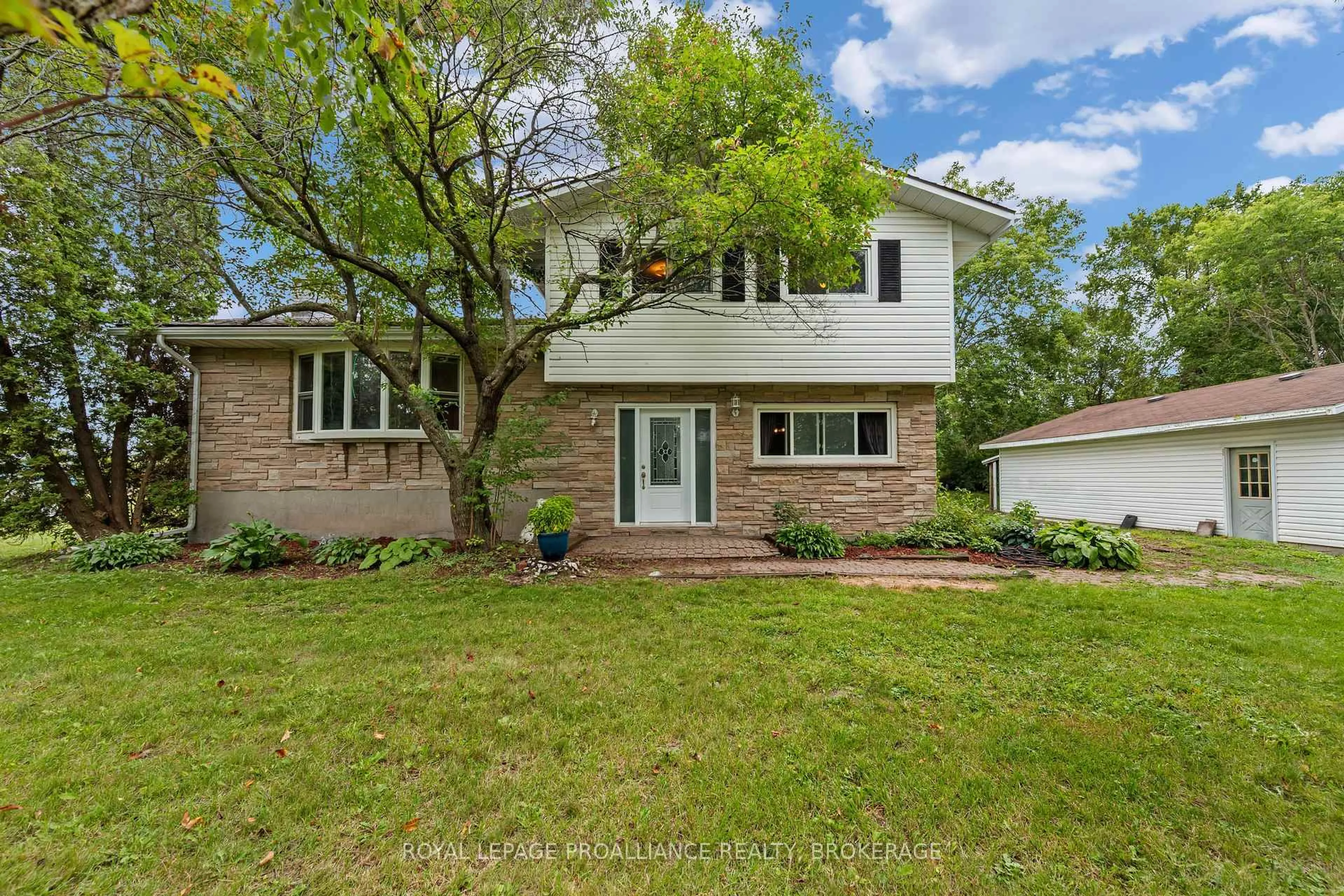 Home with brick exterior material, street for 3298 Perth Rd, Inverary Ontario K0H 1X0