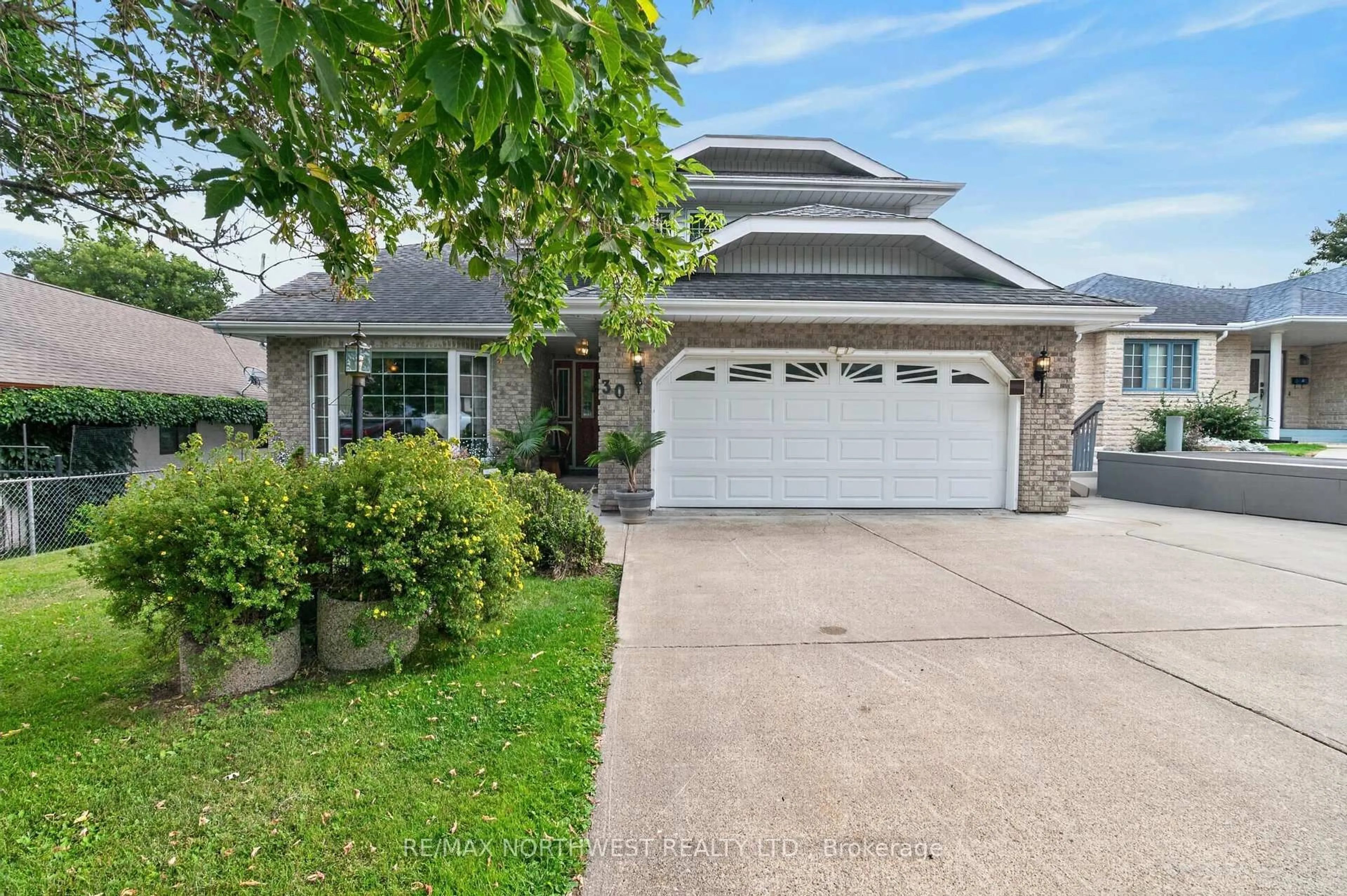 Home with vinyl exterior material, street for 30 Sandstone Place, Kenora Ontario P9N 4E3