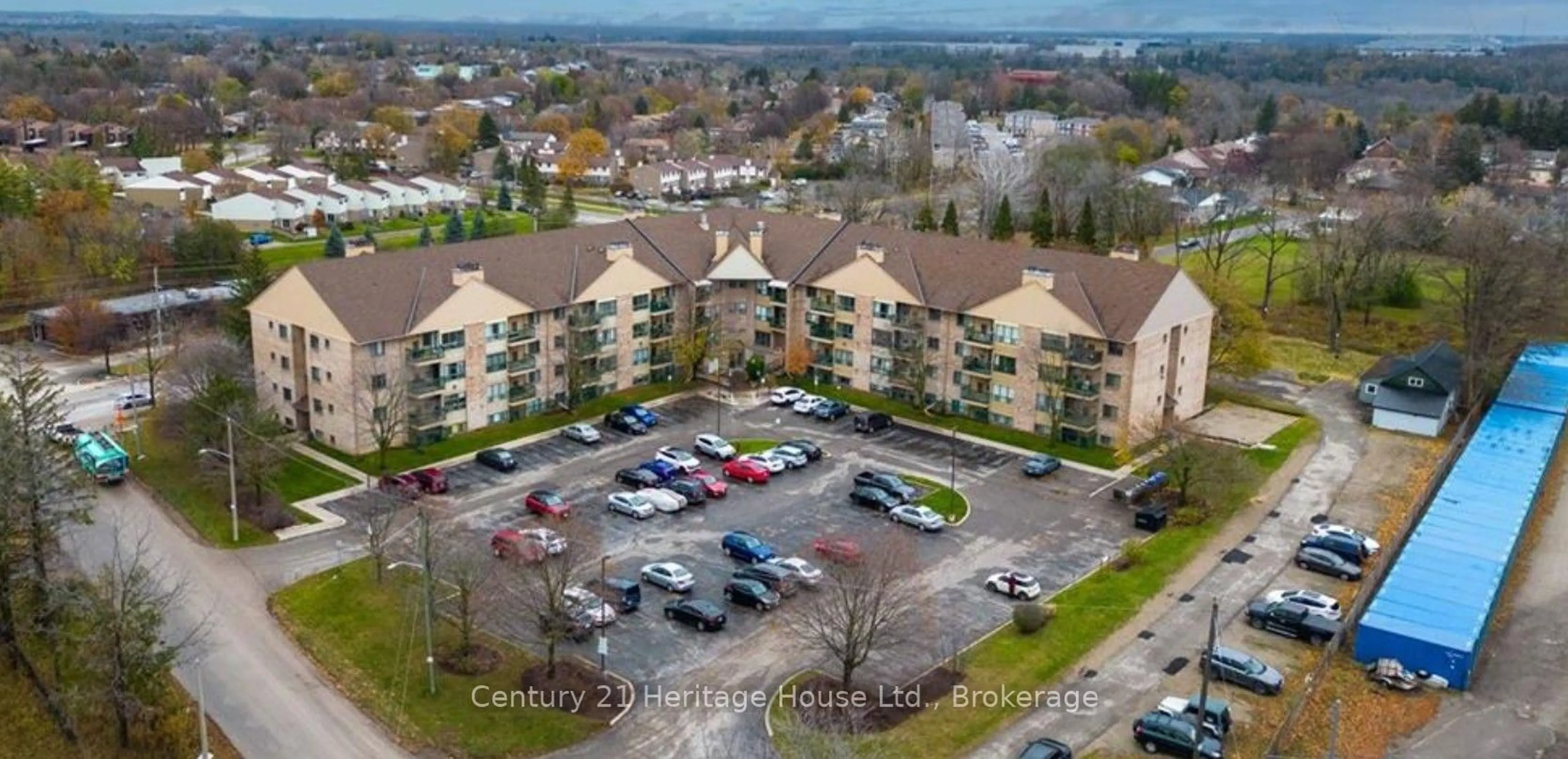 A pic from outside/outdoor area/front of a property/back of a property/a pic from drone, unknown for 15 Hofstetter Ave #318, Kitchener Ontario N2A 3Z7