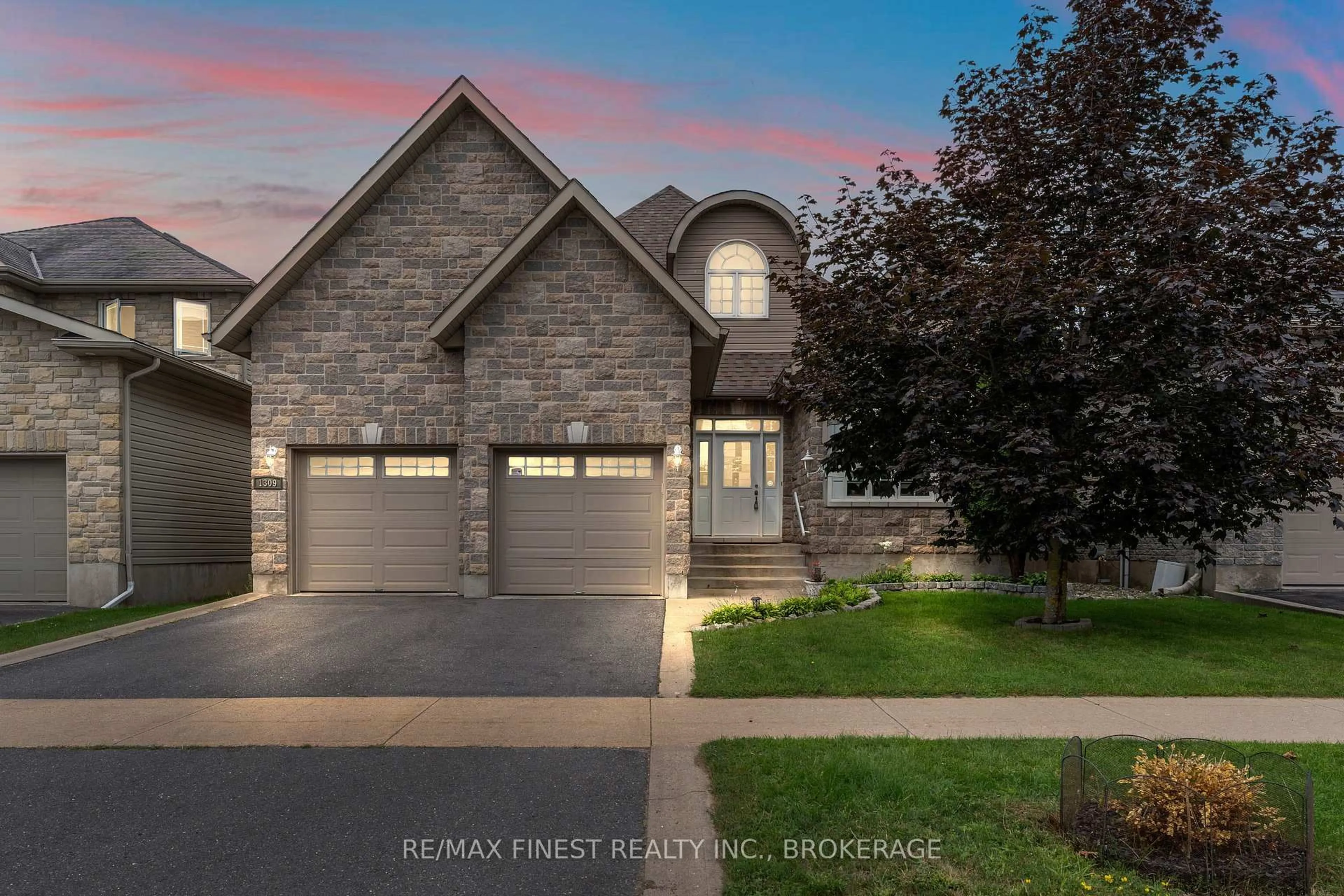 Home with brick exterior material, street for 1309 Andersen Dr, Kingston Ontario K7P 0C6