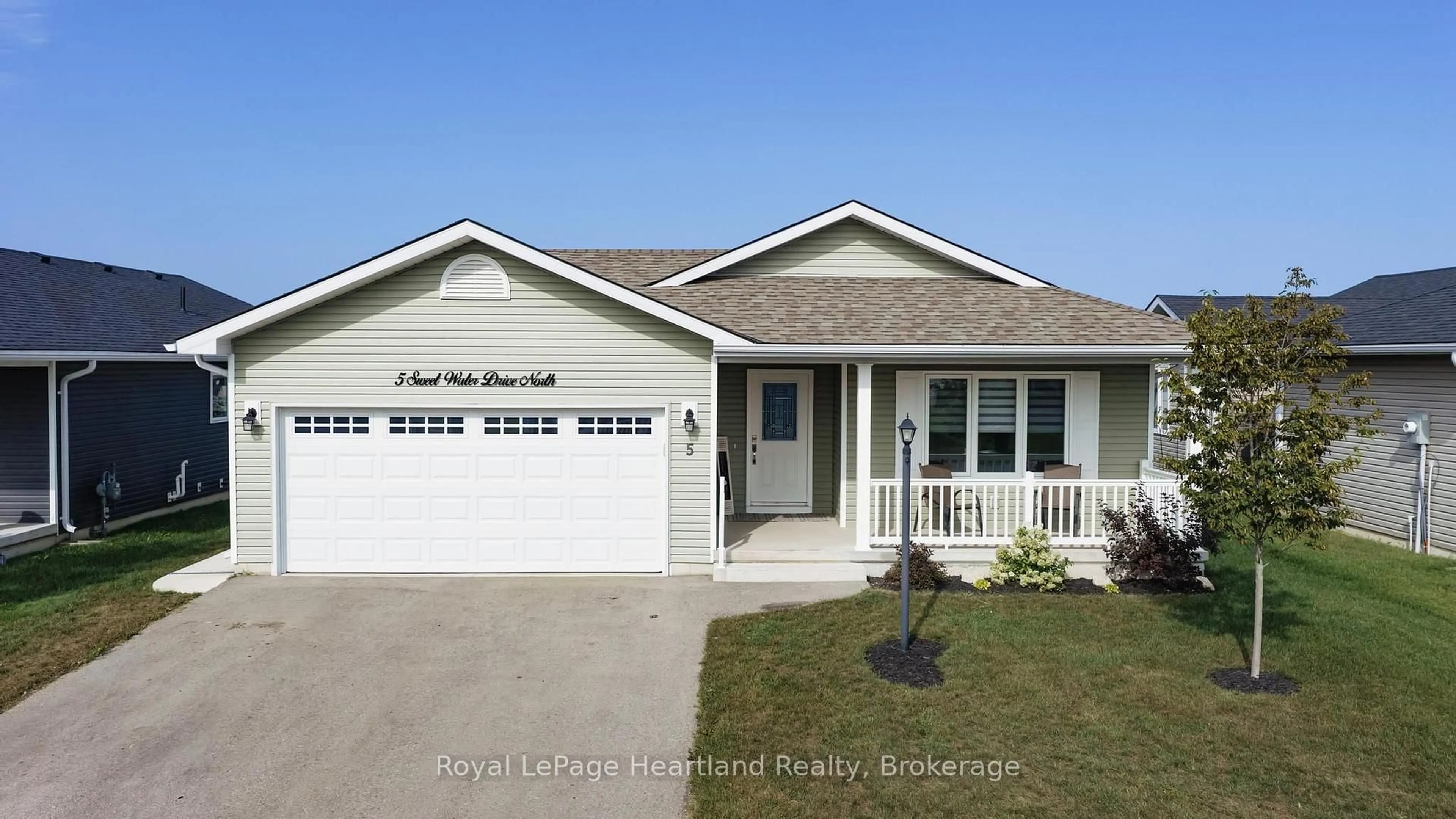 Home with vinyl exterior material, street for 5 SWEETWATER Dr, Ashfield-Colborne-Wawanosh Ontario N7A 0B9