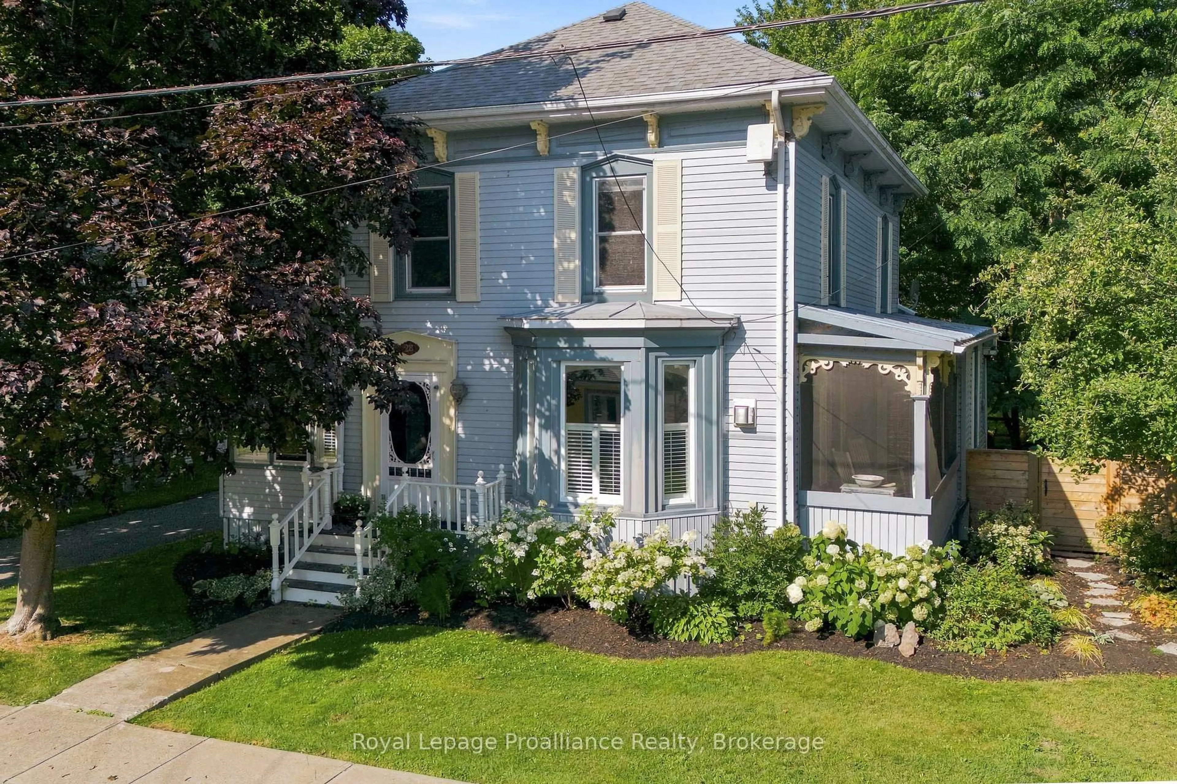 Home with vinyl exterior material, street for 28 West St, Prince Edward County Ontario K0K 3L0