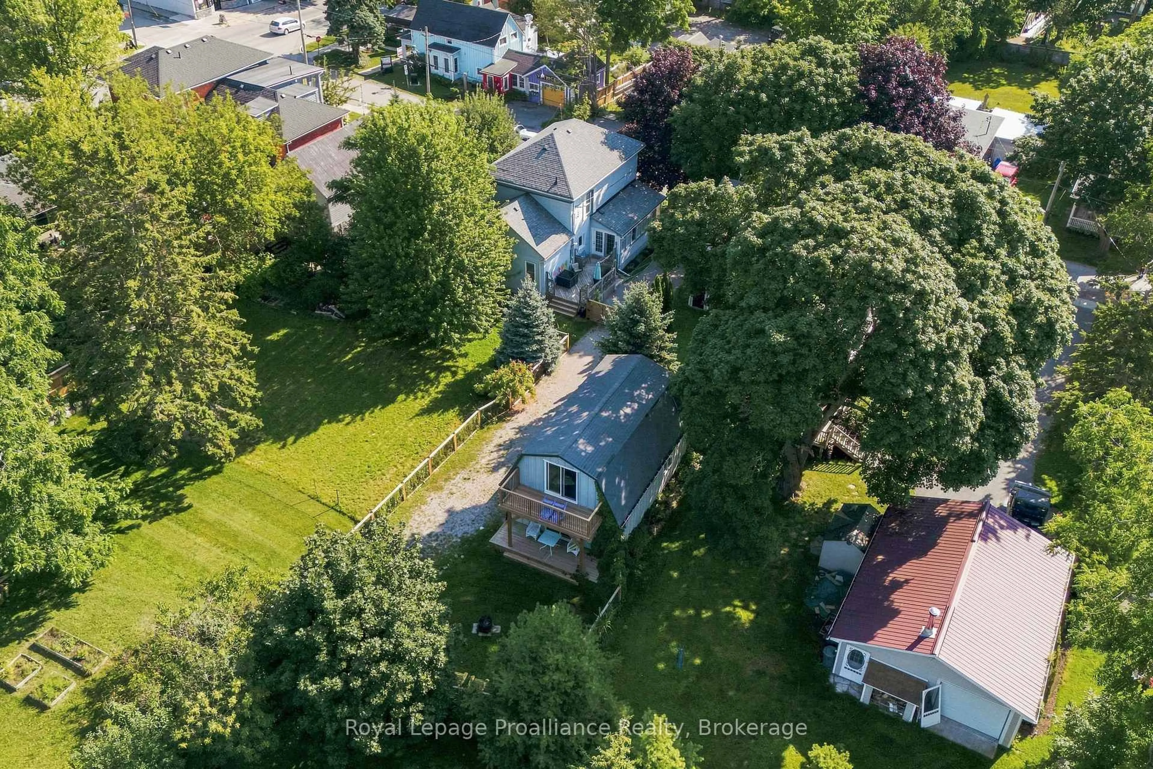 A pic from outside/outdoor area/front of a property/back of a property/a pic from drone, street for 28 West St, Prince Edward County Ontario K0K 3L0