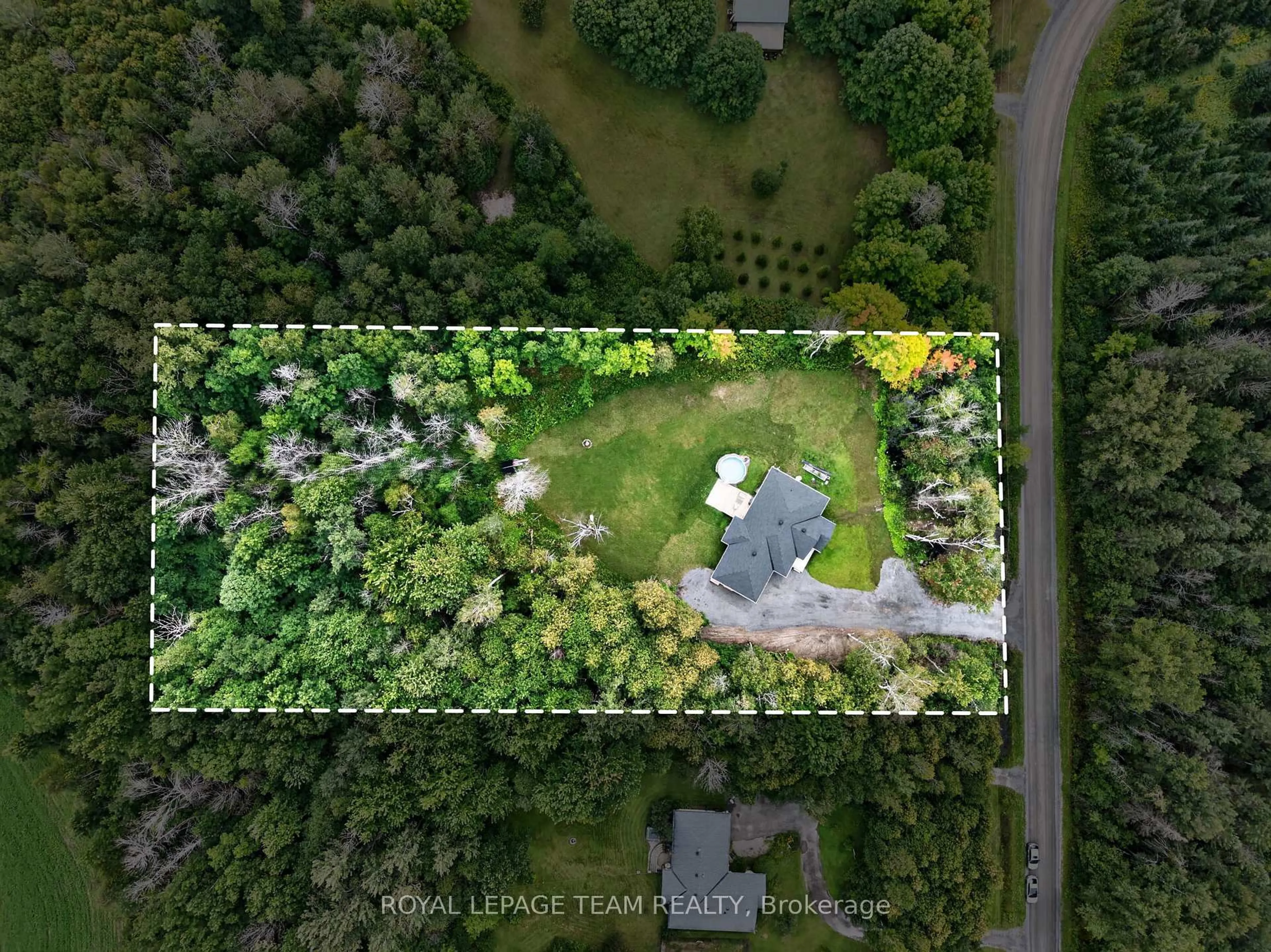 A pic from outside/outdoor area/front of a property/back of a property/a pic from drone, forest/trees view for 1007 Townline Rd, North Grenville Ontario K0G 1T0