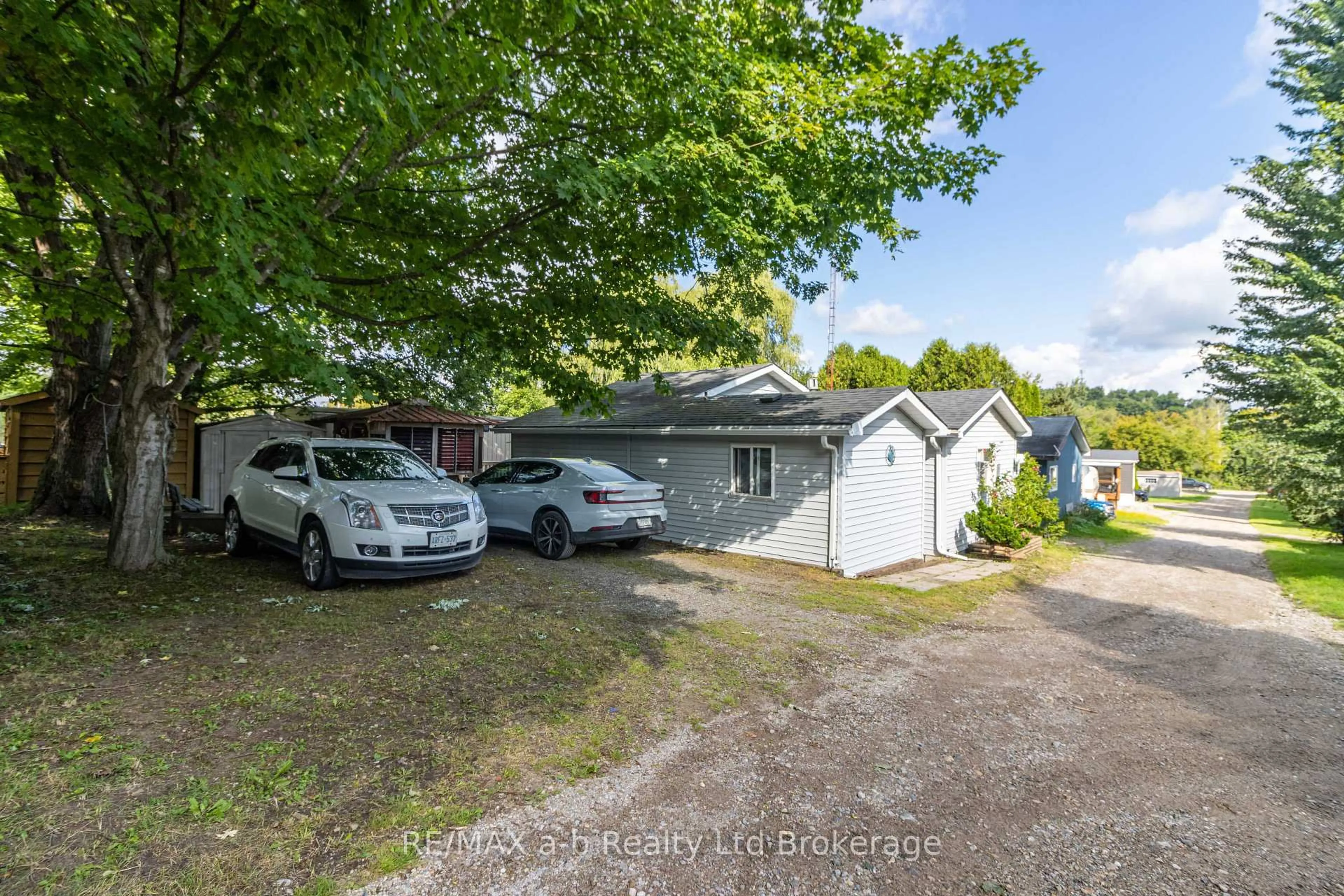 A pic from outside/outdoor area/front of a property/back of a property/a pic from drone, street for 596101 Highway 59 18 Tropicana Cres, East Zorra-Tavistock Ontario N4S 7W1