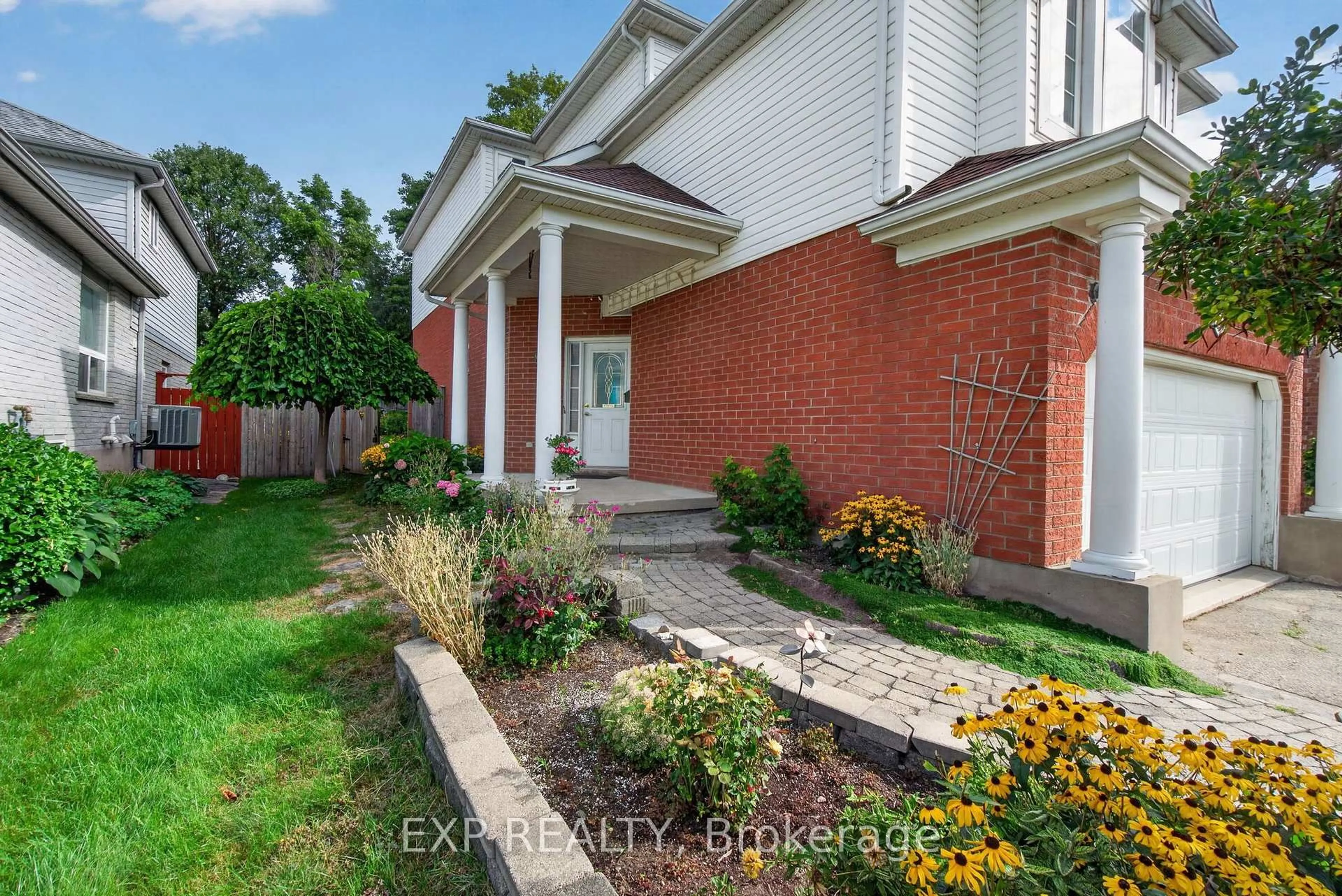 Home with brick exterior material, street for 141 Starwood Dr, Guelph Ontario N1E 7G7