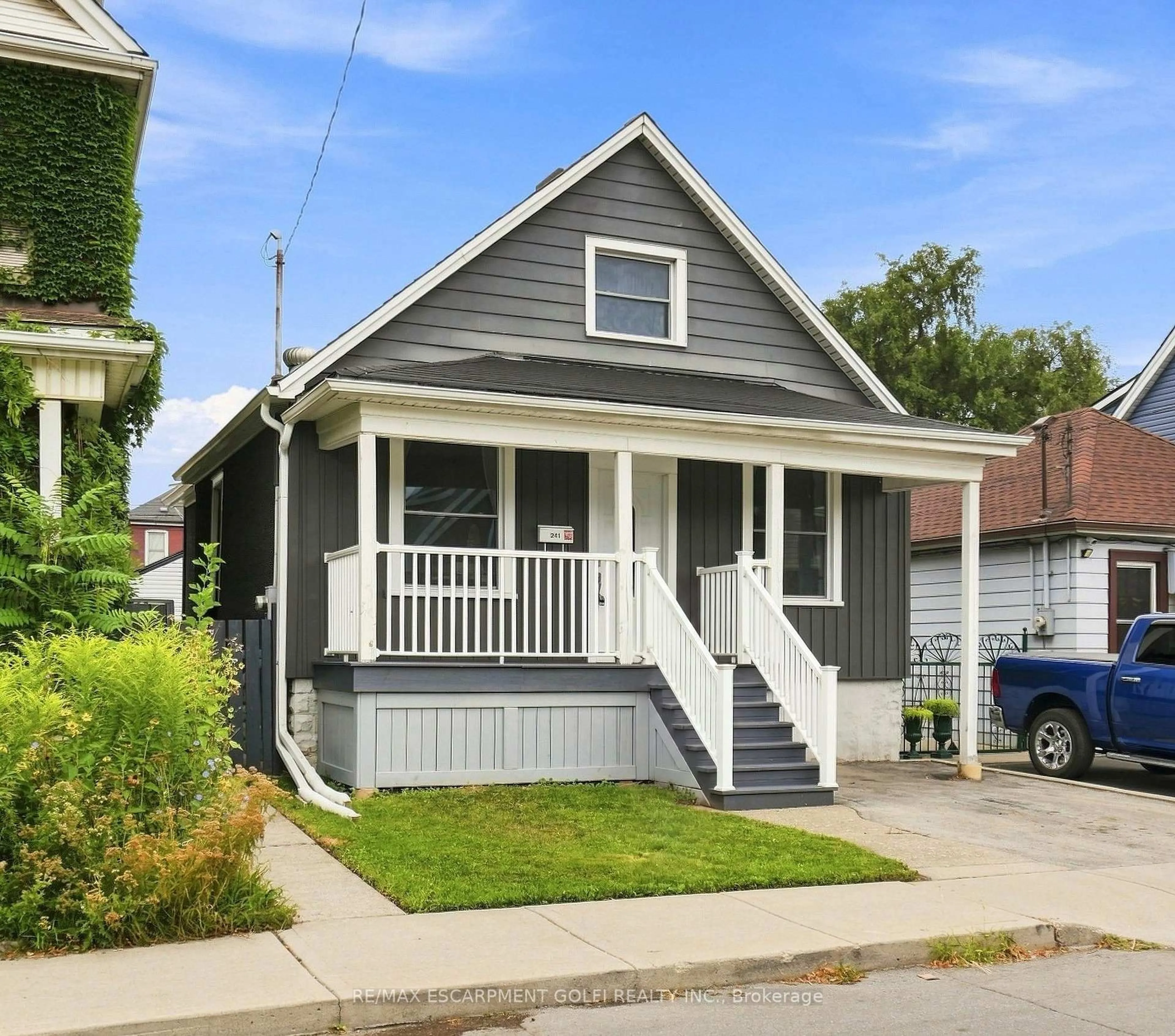 Home with vinyl exterior material, street for 241 Rosslyn Ave, Hamilton Ontario L8L 7P9