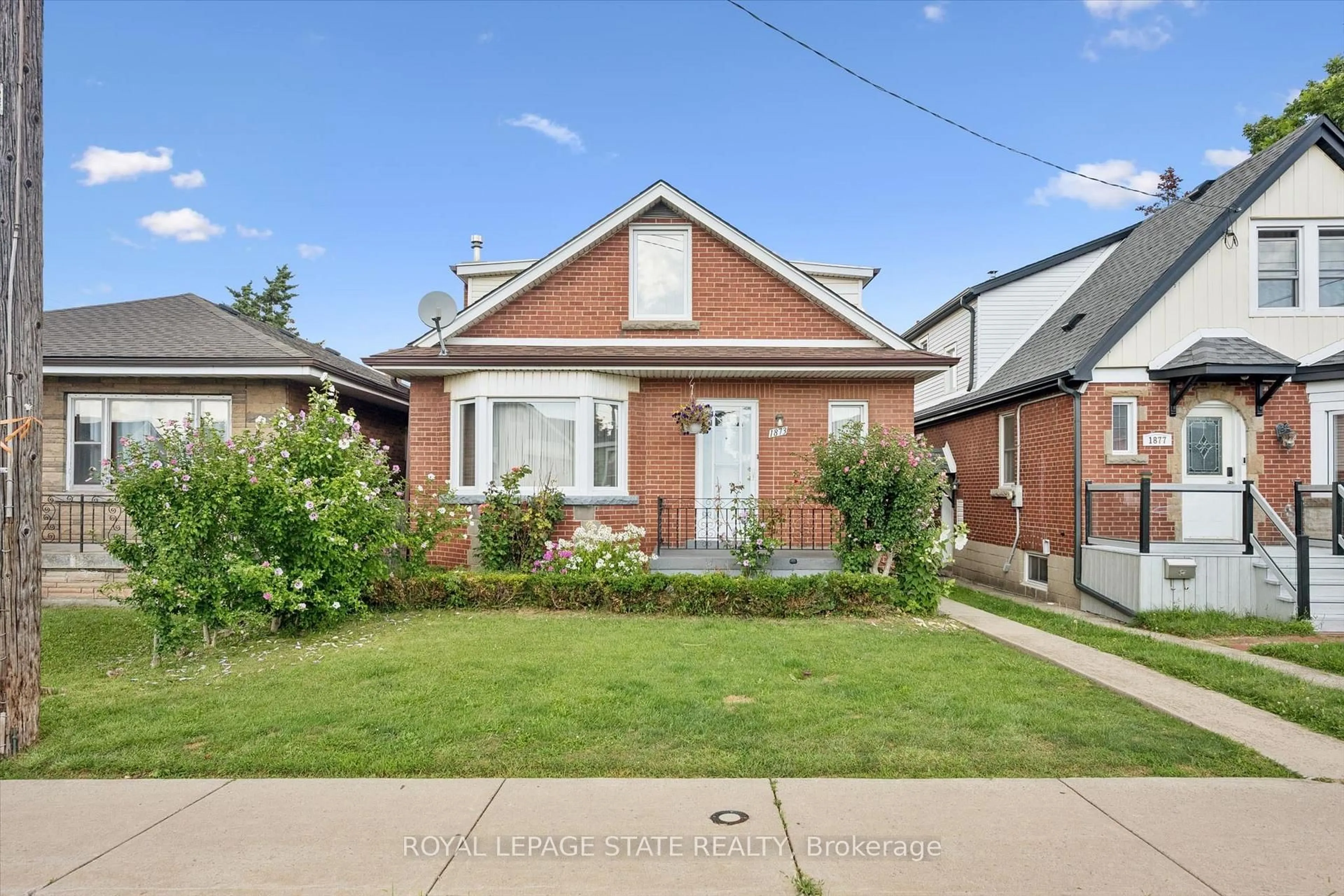 Home with brick exterior material, street for 1873 Main St, Hamilton Ontario L8H 1G3