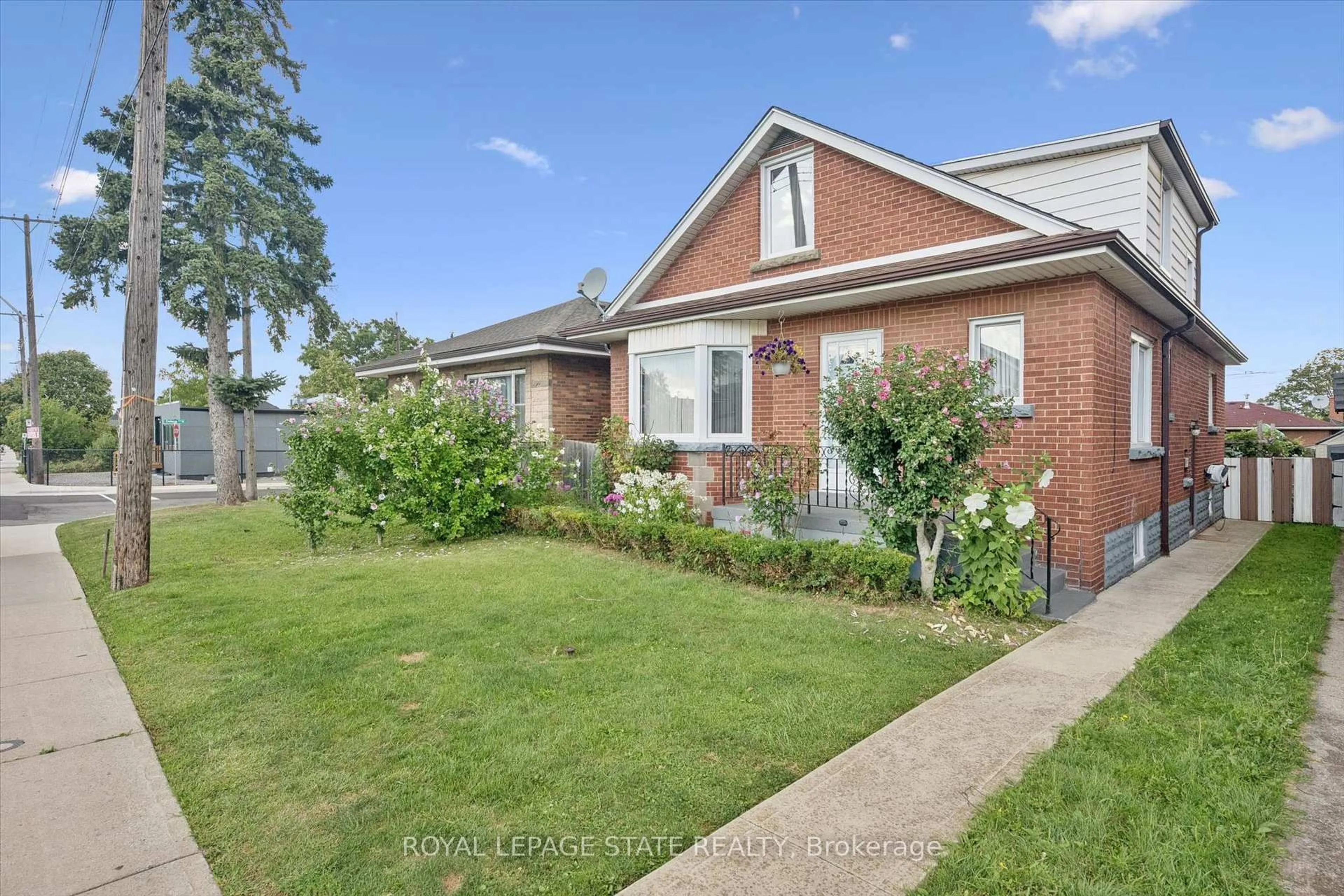 Home with brick exterior material, street for 1873 Main St, Hamilton Ontario L8H 1G3
