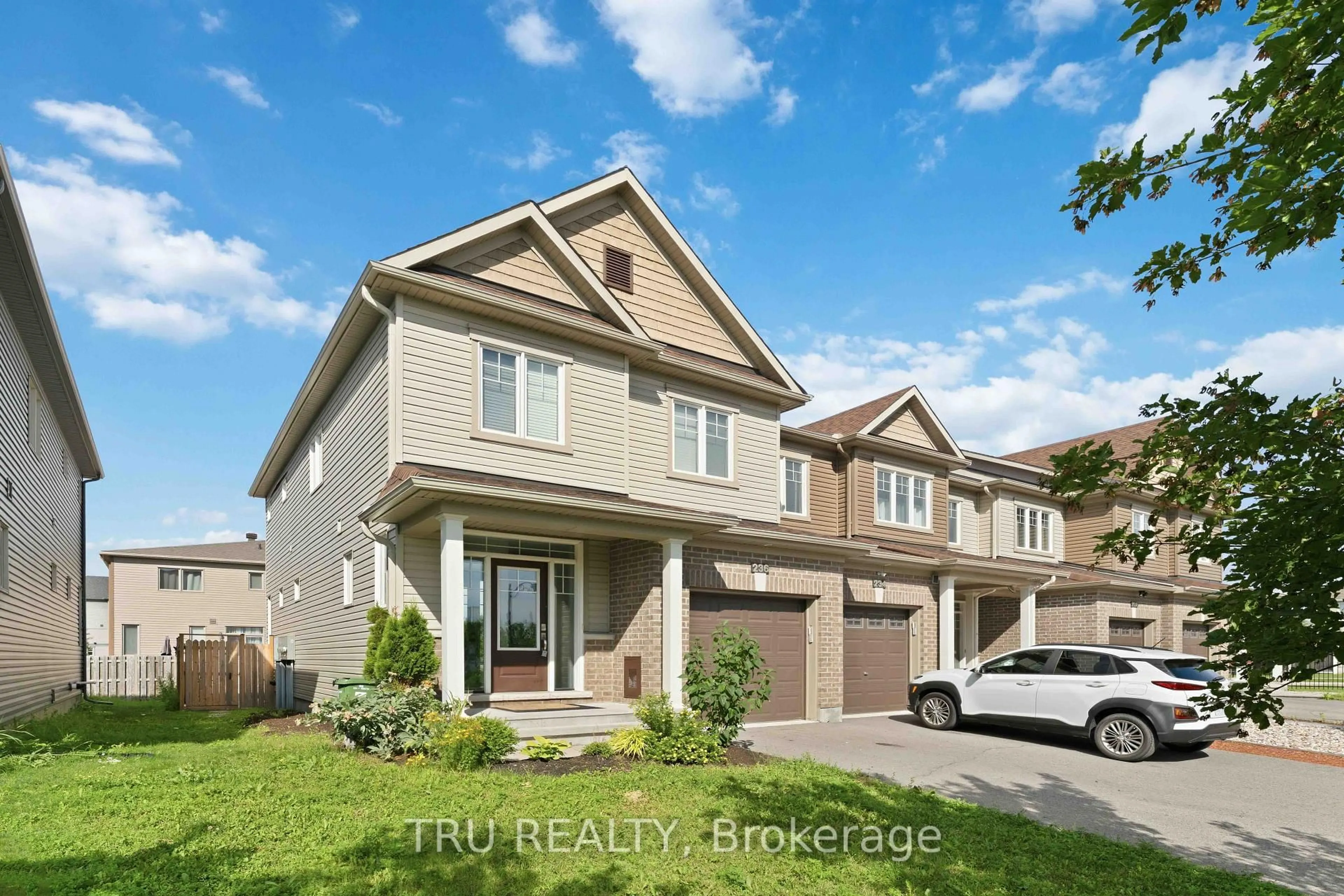 Home with brick exterior material, street for 236 Yellowcress Way, Ottawa Ontario K4A 1C3