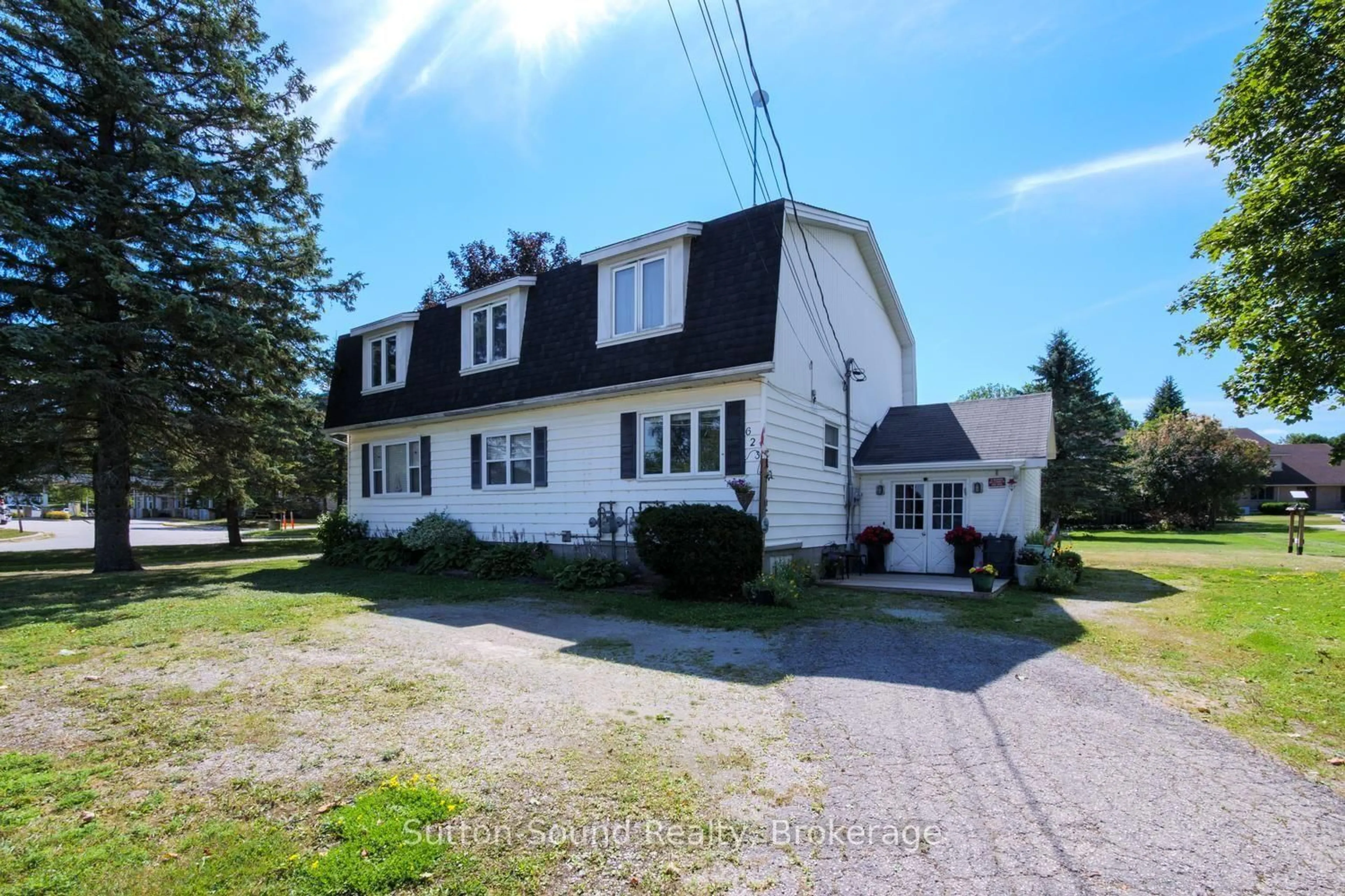 A pic from outside/outdoor area/front of a property/back of a property/a pic from drone, street for 623 Frank St, South Bruce Peninsula Ontario N0H 2T0