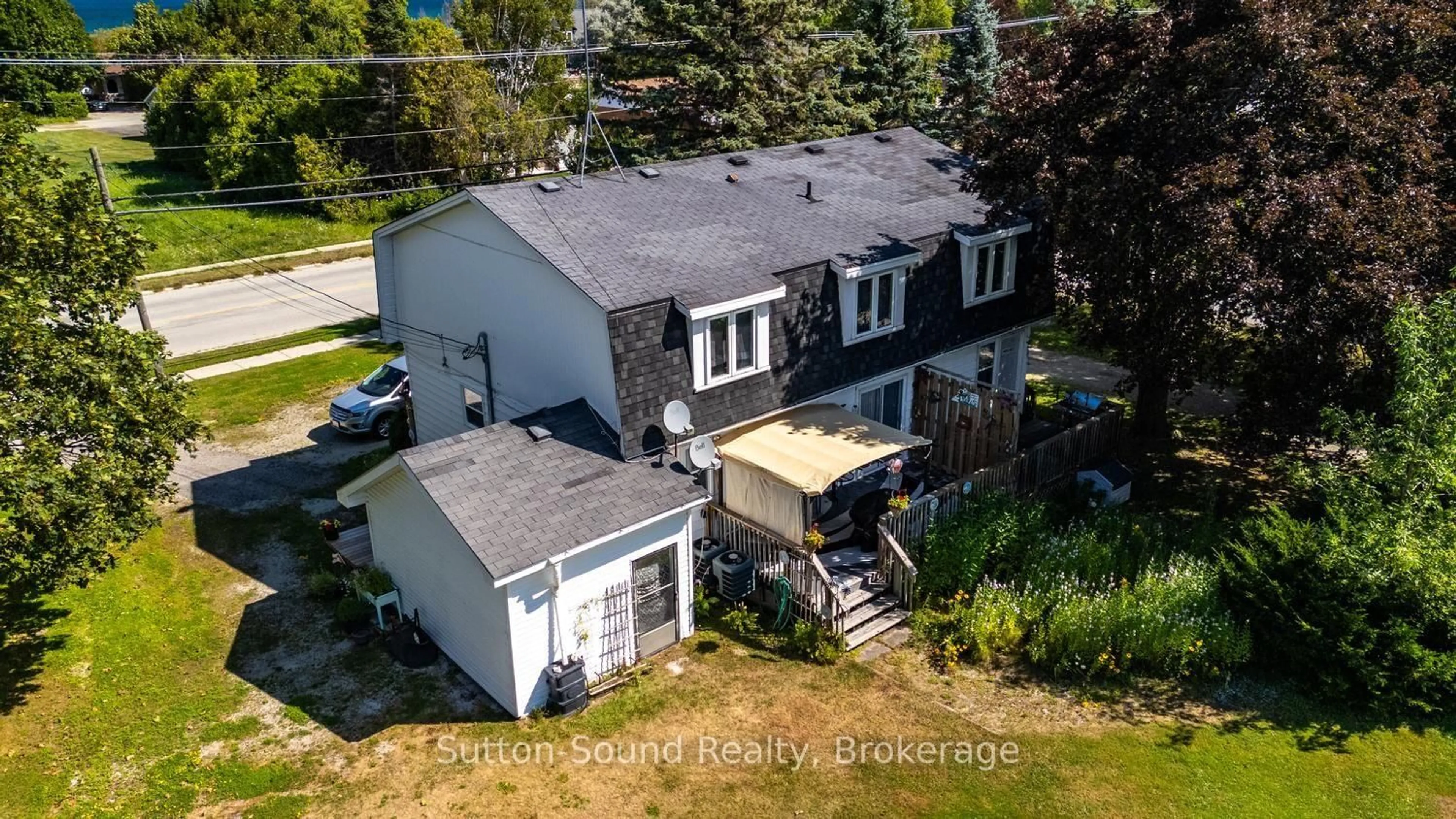 A pic from outside/outdoor area/front of a property/back of a property/a pic from drone, unknown for 623 Frank St, South Bruce Peninsula Ontario N0H 2T0