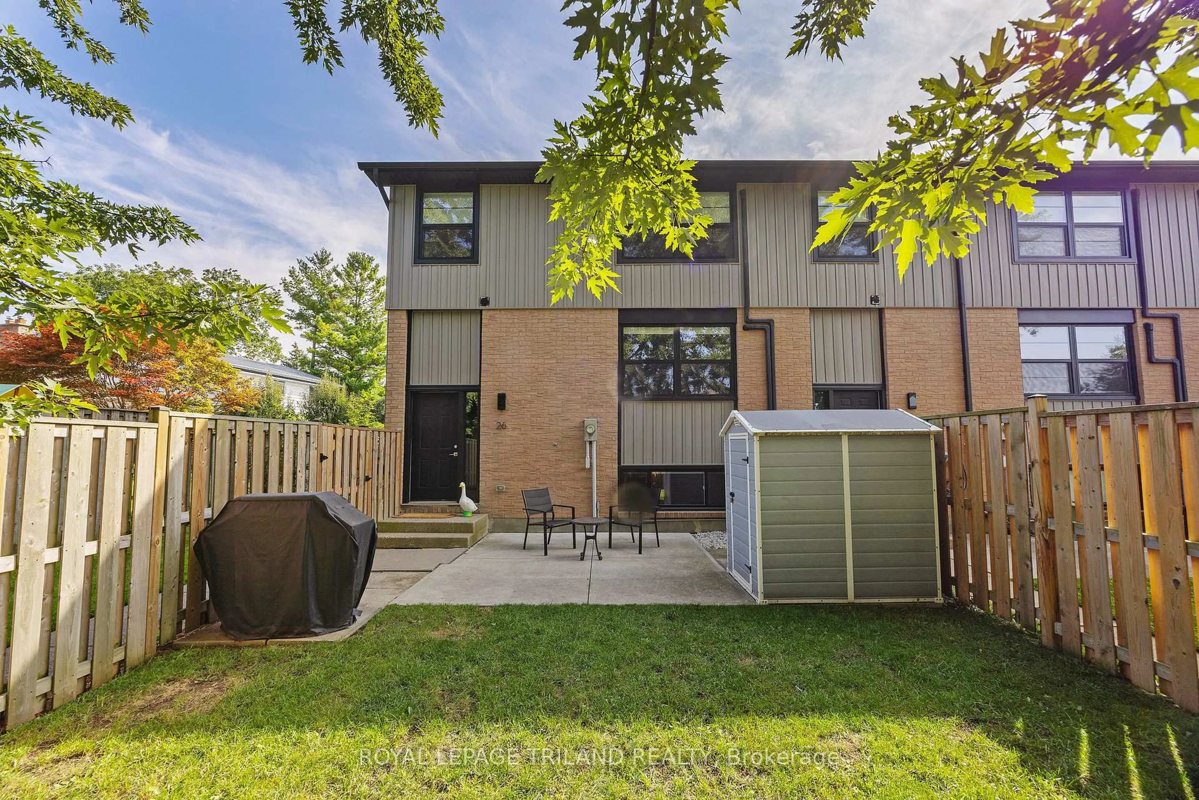 A pic from outside/outdoor area/front of a property/back of a property/a pic from drone, street for 105 Andover Dr #26, London South Ontario N6J 4B1
