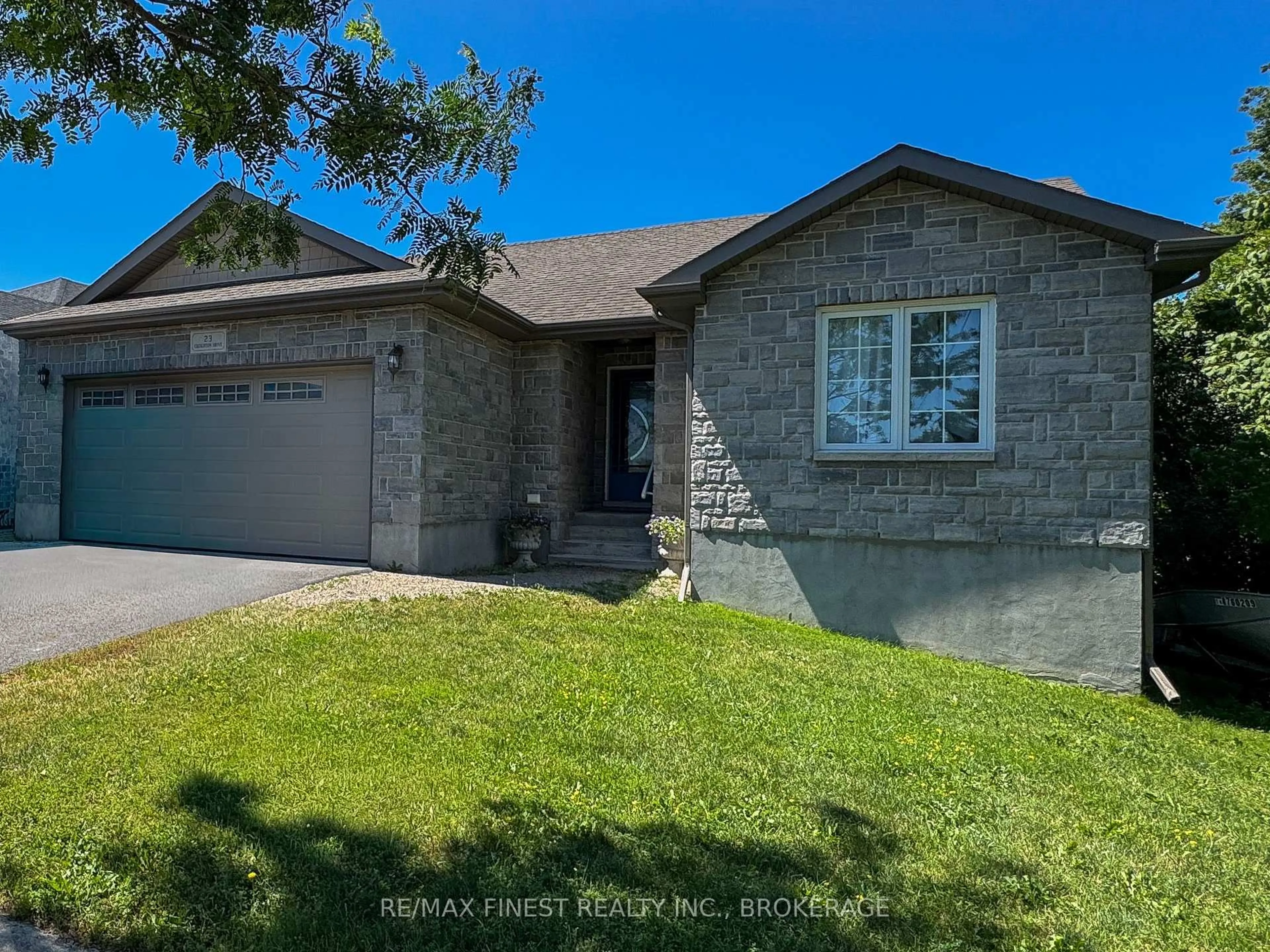 Home with brick exterior material, street for 23 Creighton Dr, Bissett Creek Ontario K0H 2H0