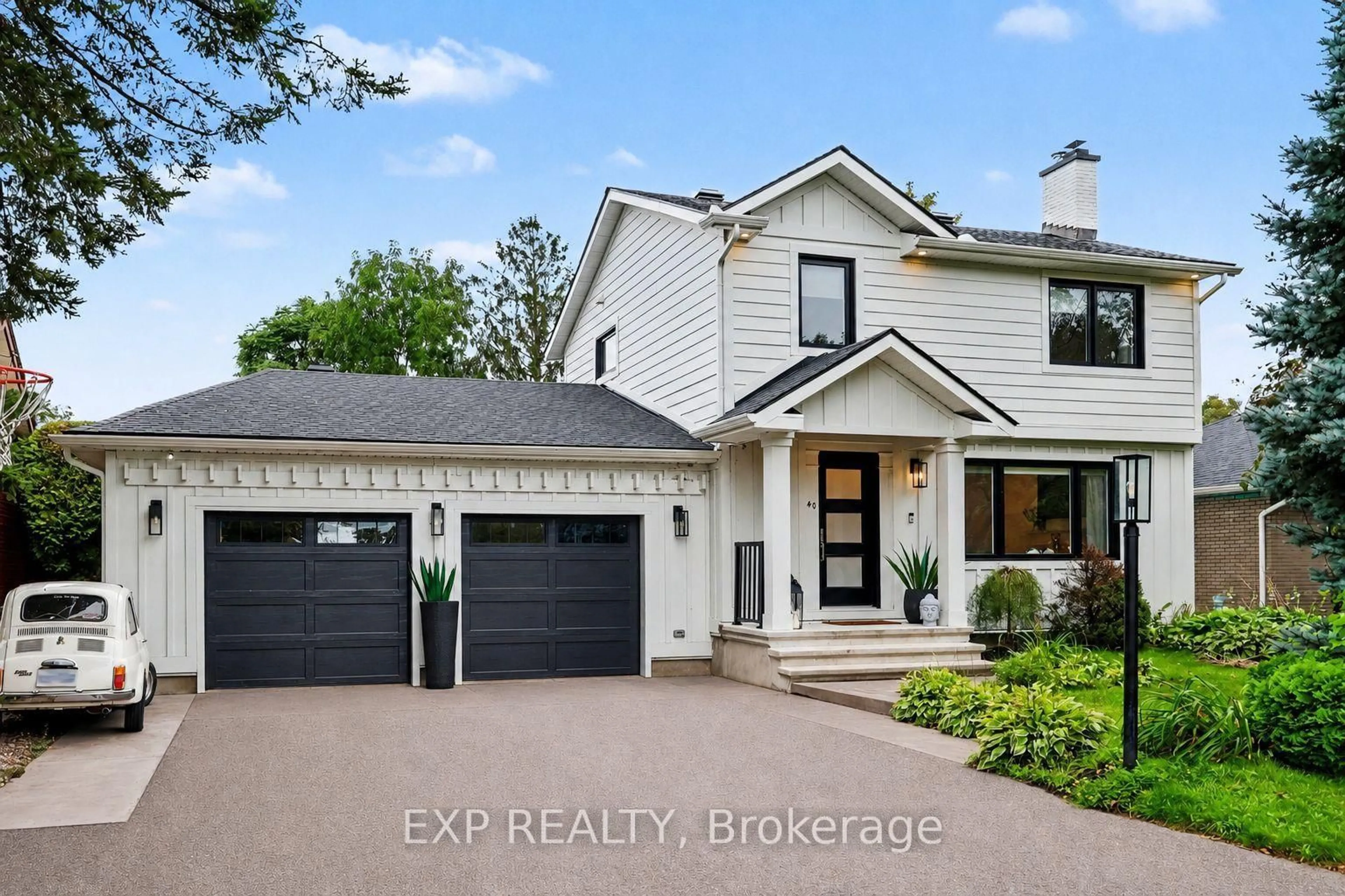Home with vinyl exterior material, street for 40 Epworth Ave, Ottawa Ontario K2G 2L7
