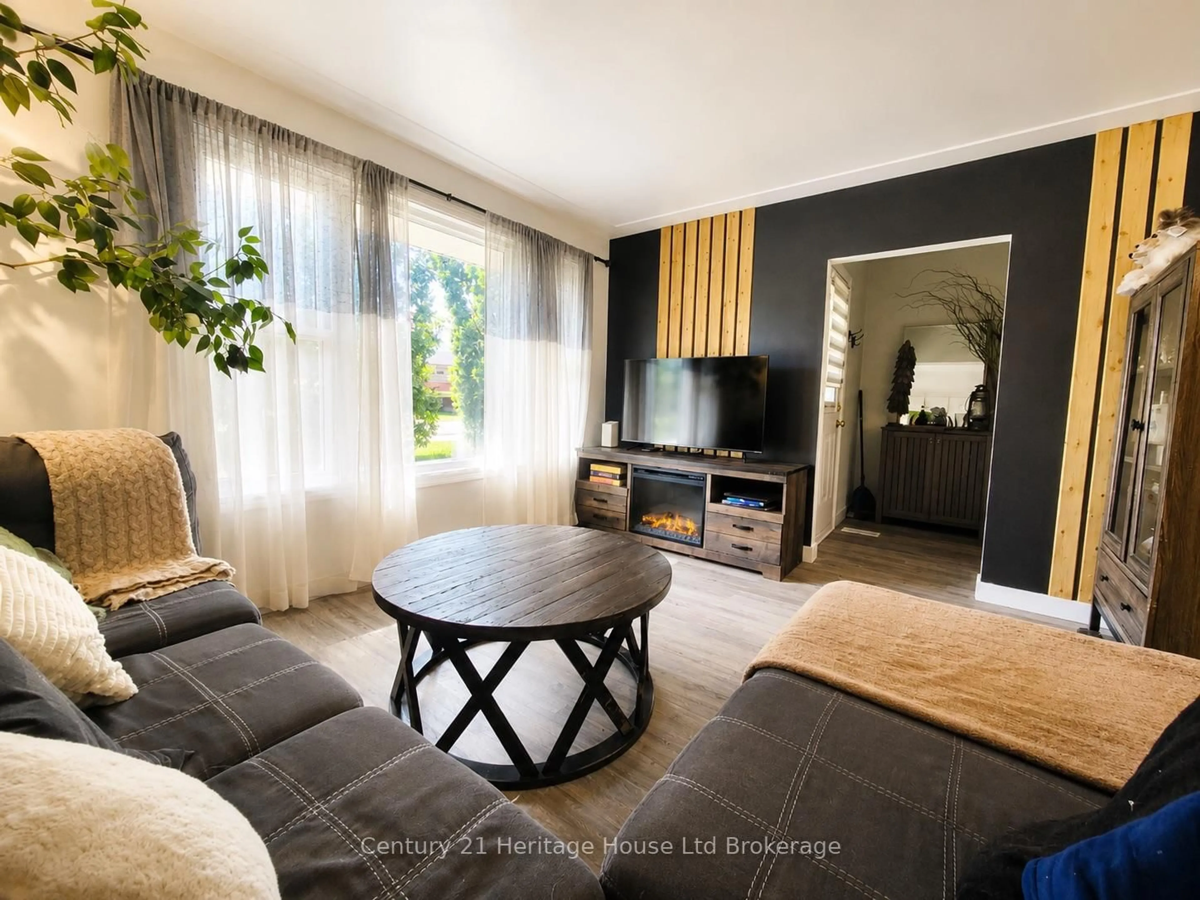 Living room with furniture, unknown for 54 Frontenac Rd #A, London South Ontario N5Z 3Y6