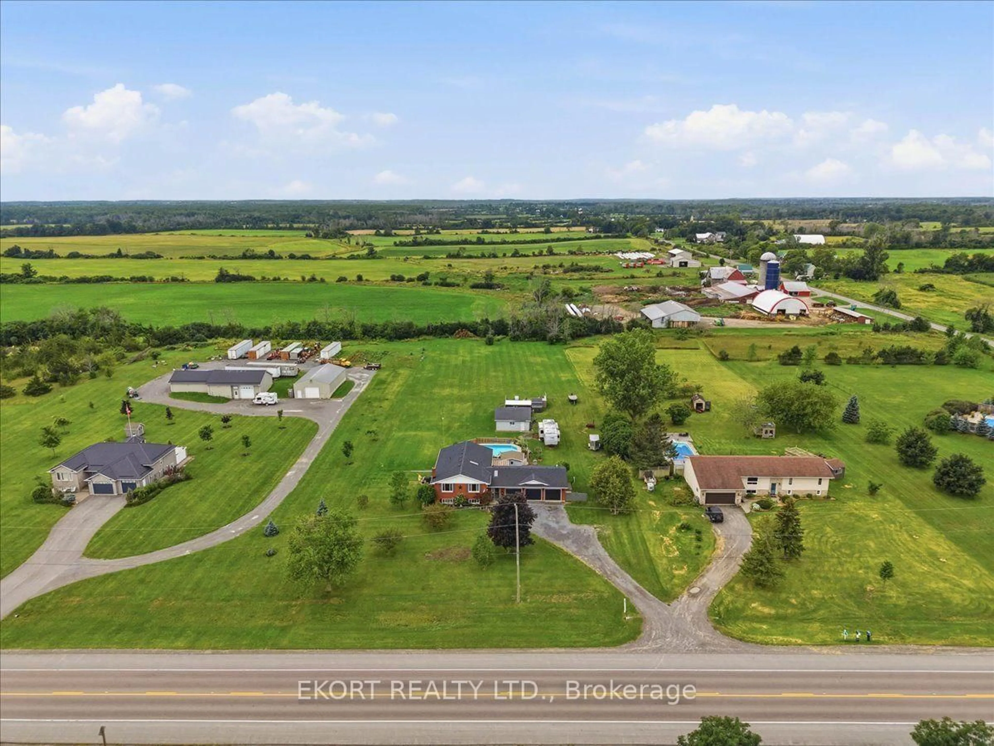 A pic from outside/outdoor area/front of a property/back of a property/a pic from drone, street for 2433 62 Highway, Prince Edward County Ontario K0K 1G0
