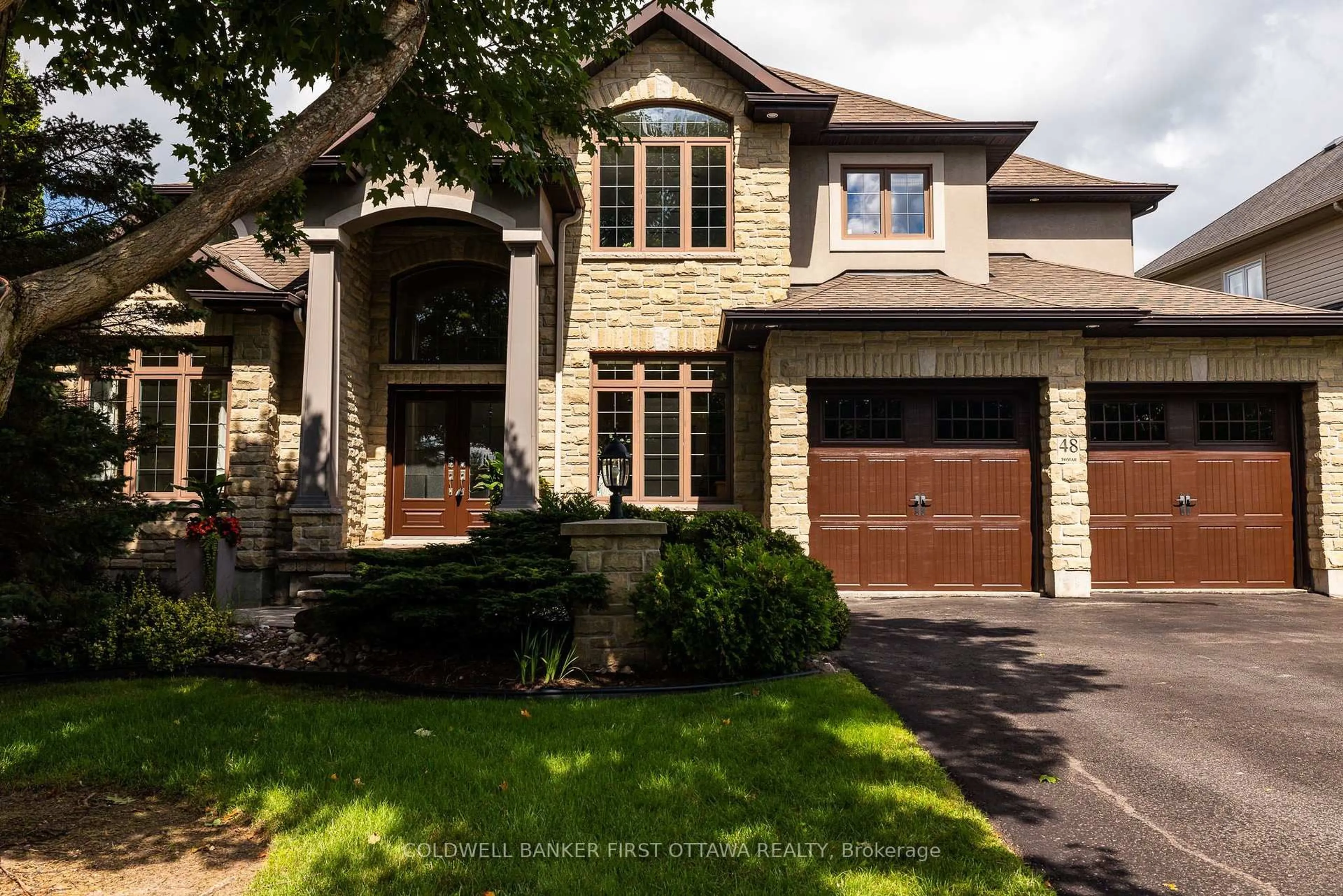 Home with brick exterior material, street for 48 BERT G ARGUE Dr, Stittsville Ontario K2S 2H2