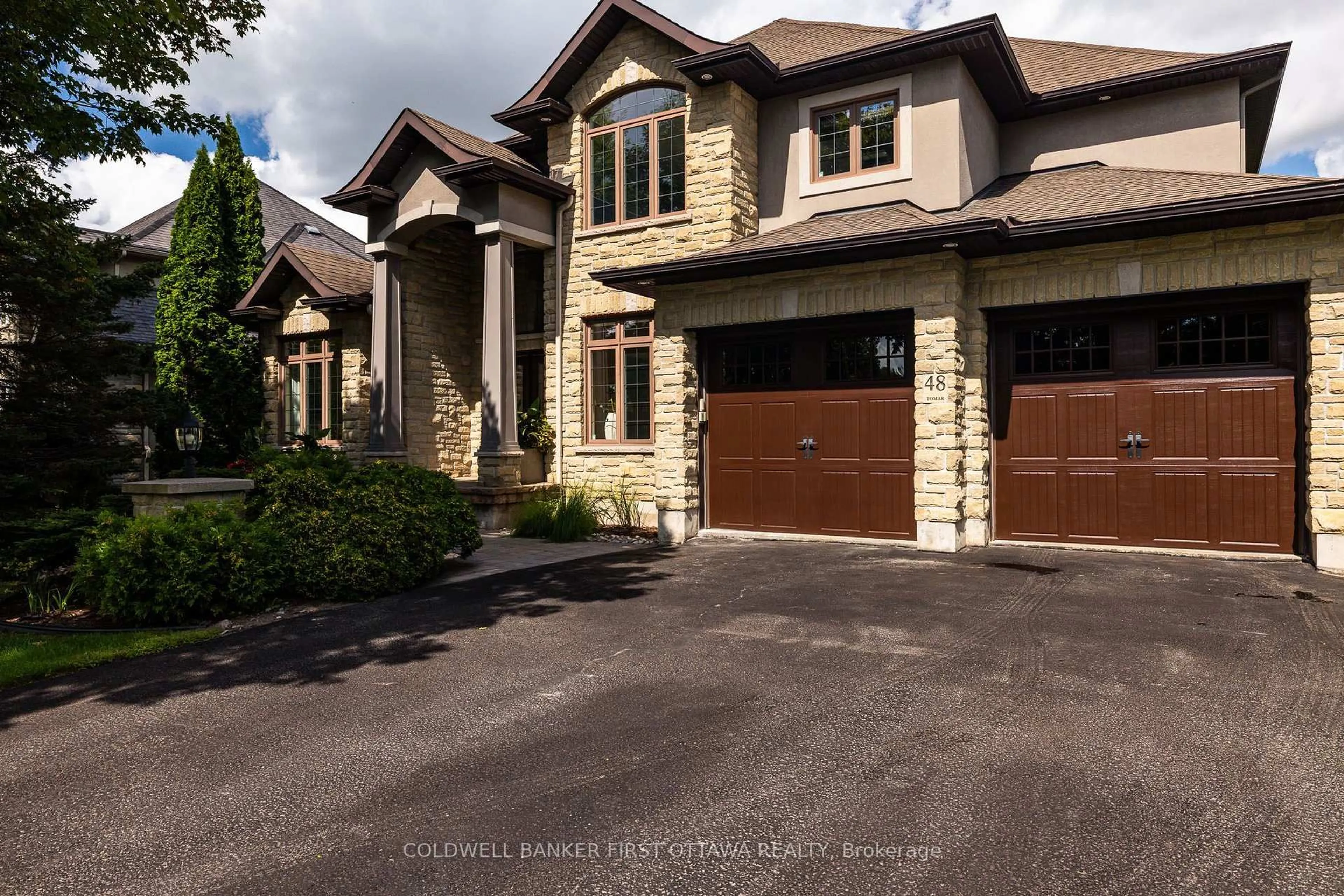 Home with brick exterior material, street for 48 BERT G ARGUE Dr, Stittsville Ontario K2S 2H2