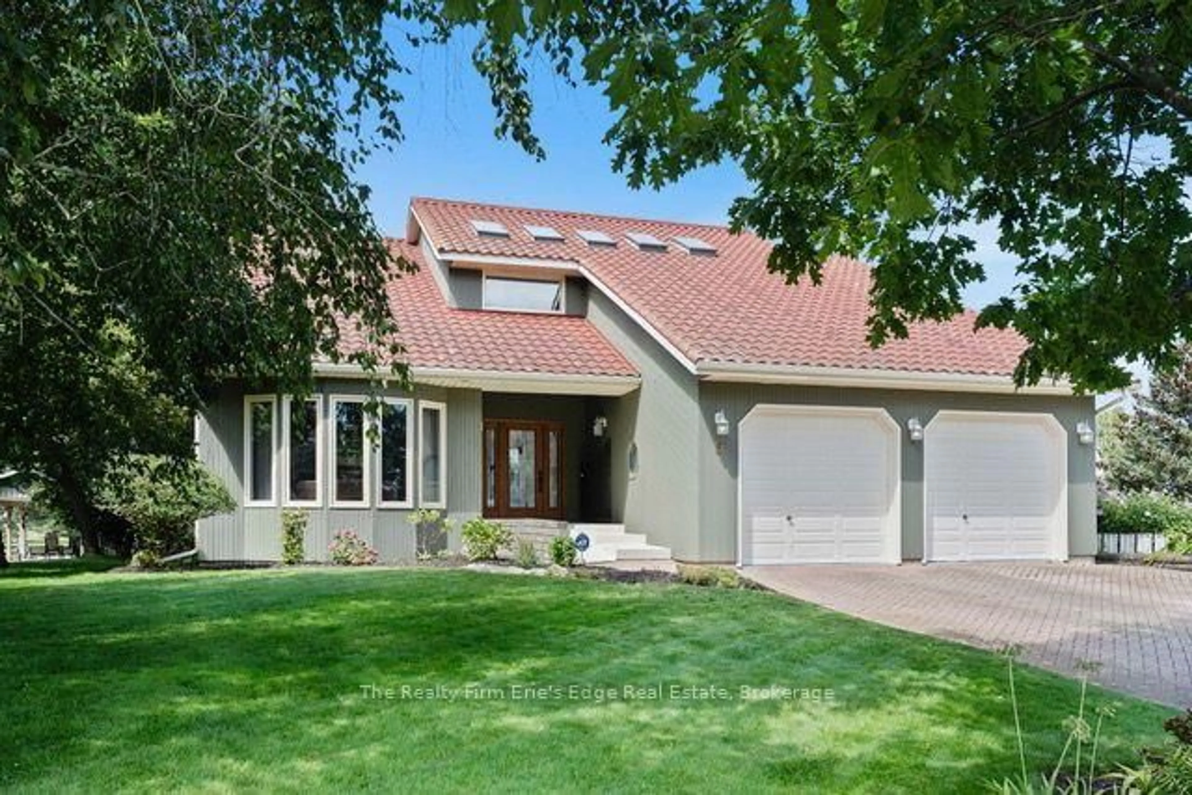 Home with vinyl exterior material, street for 6 Howey Ave, Norfolk Ontario N0E 1M0