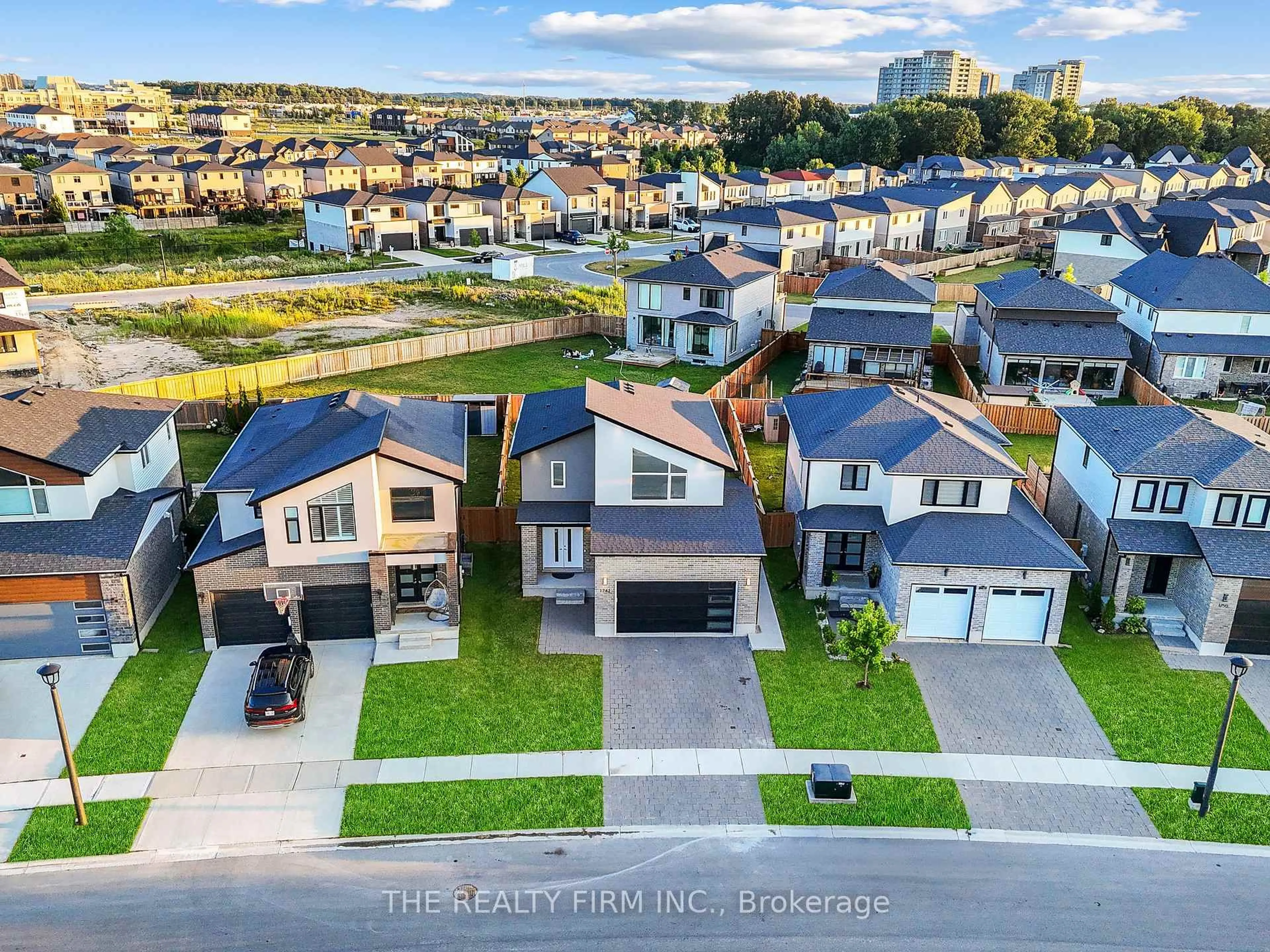 A pic from outside/outdoor area/front of a property/back of a property/a pic from drone, water/lake/river/ocean view for 1742 Applerock Ave, London North Ontario N6G 0X7