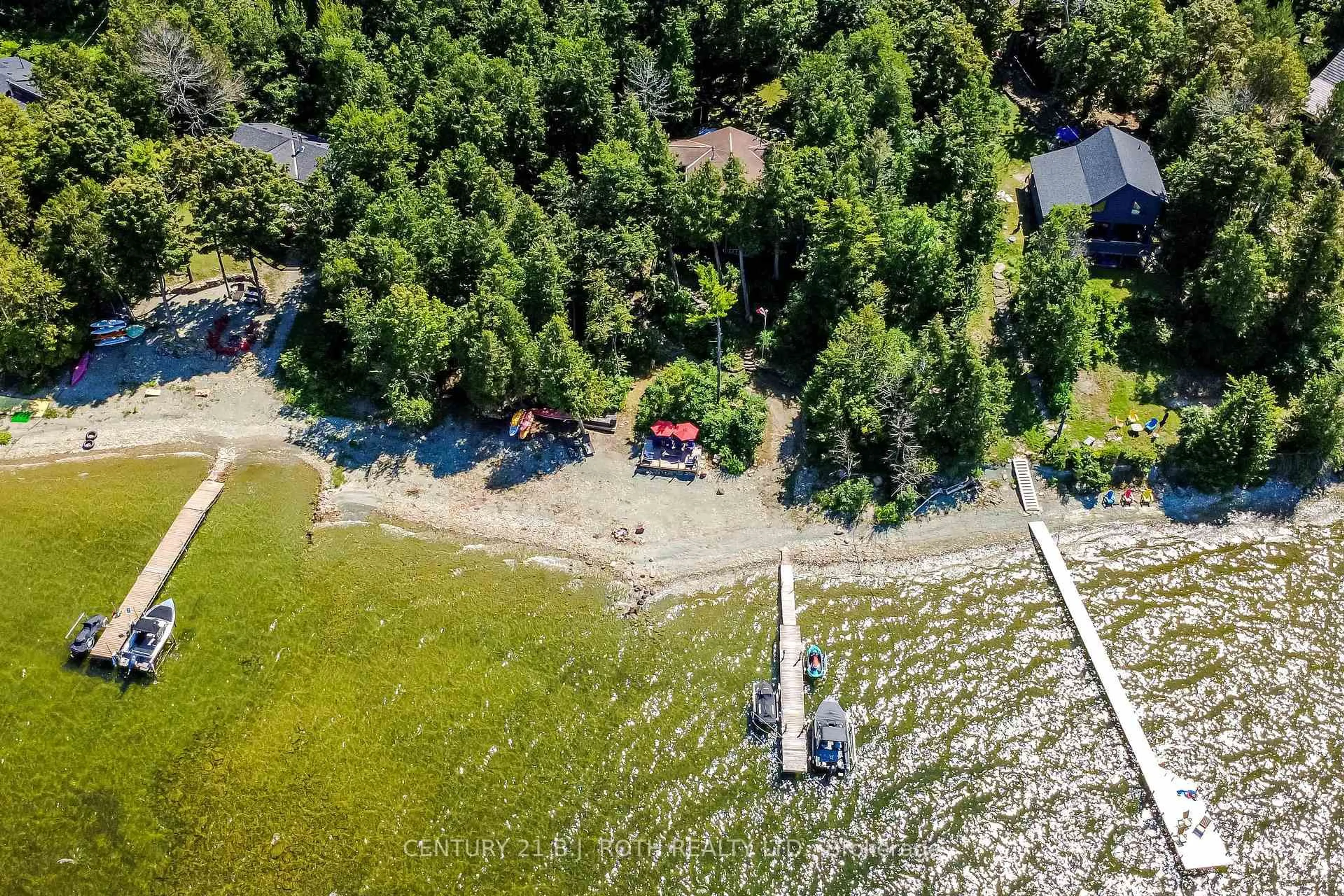 A pic from outside/outdoor area/front of a property/back of a property/a pic from drone, water/lake/river/ocean view for 2504 ISLAND 404/QUARRY, Georgian Bay Ontario P0E 1E0
