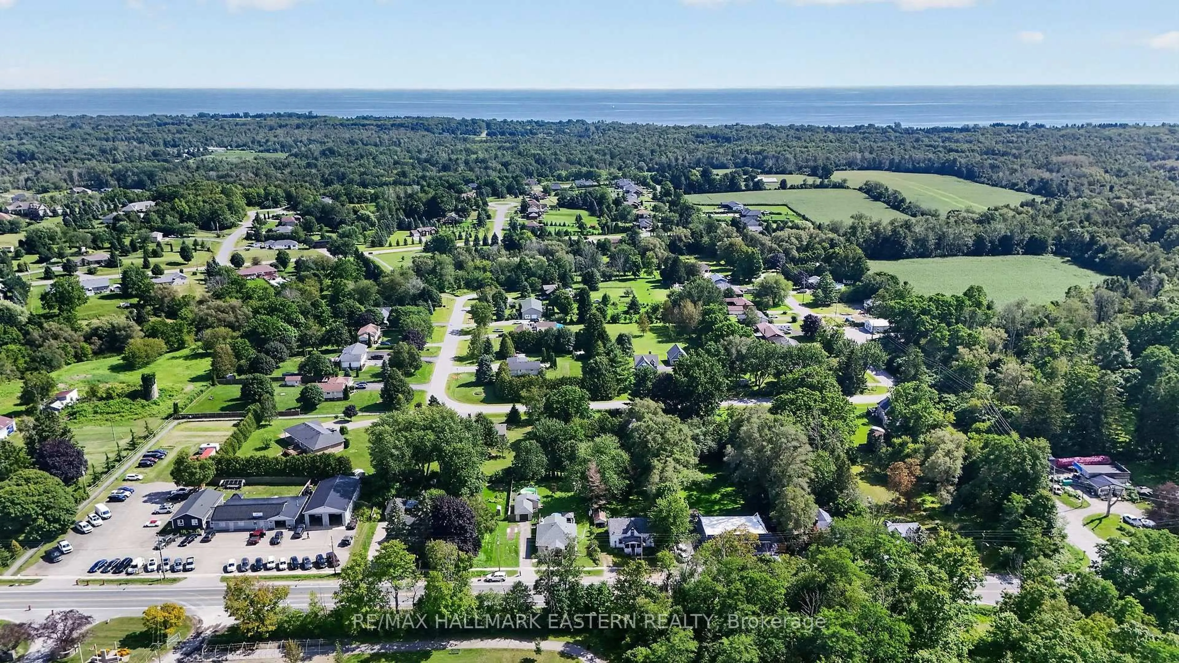 A pic from outside/outdoor area/front of a property/back of a property/a pic from drone, water/lake/river/ocean view for 10747 County Road 2, Haldimand Ontario K0K 2G0
