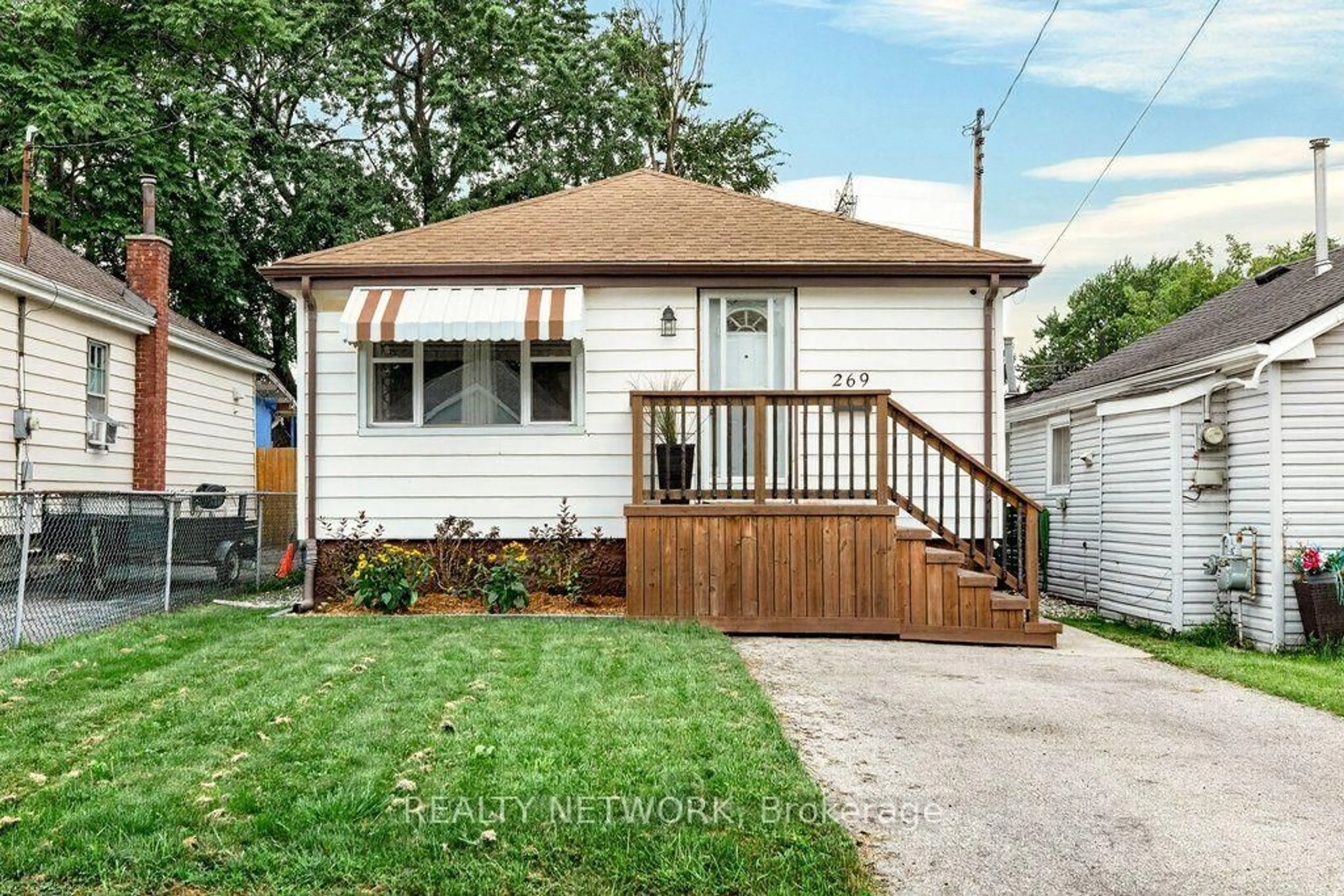 Home with vinyl exterior material, street for 269 Tolton Ave, Hamilton Ontario L8H 5P4