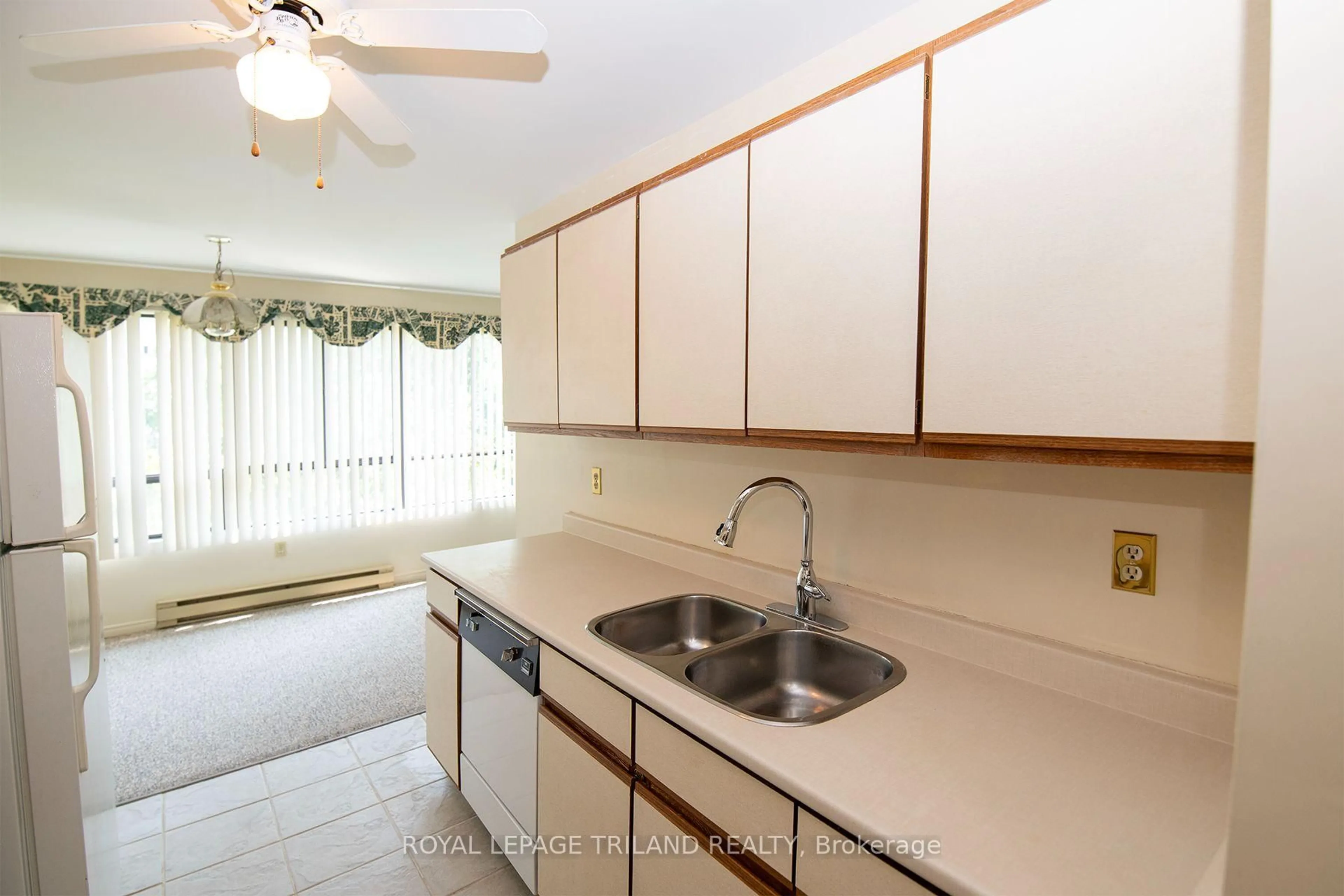 Standard kitchen, ceramic/tile floor for 135 Base Line Rd #507, London South Ontario N6J 4W4
