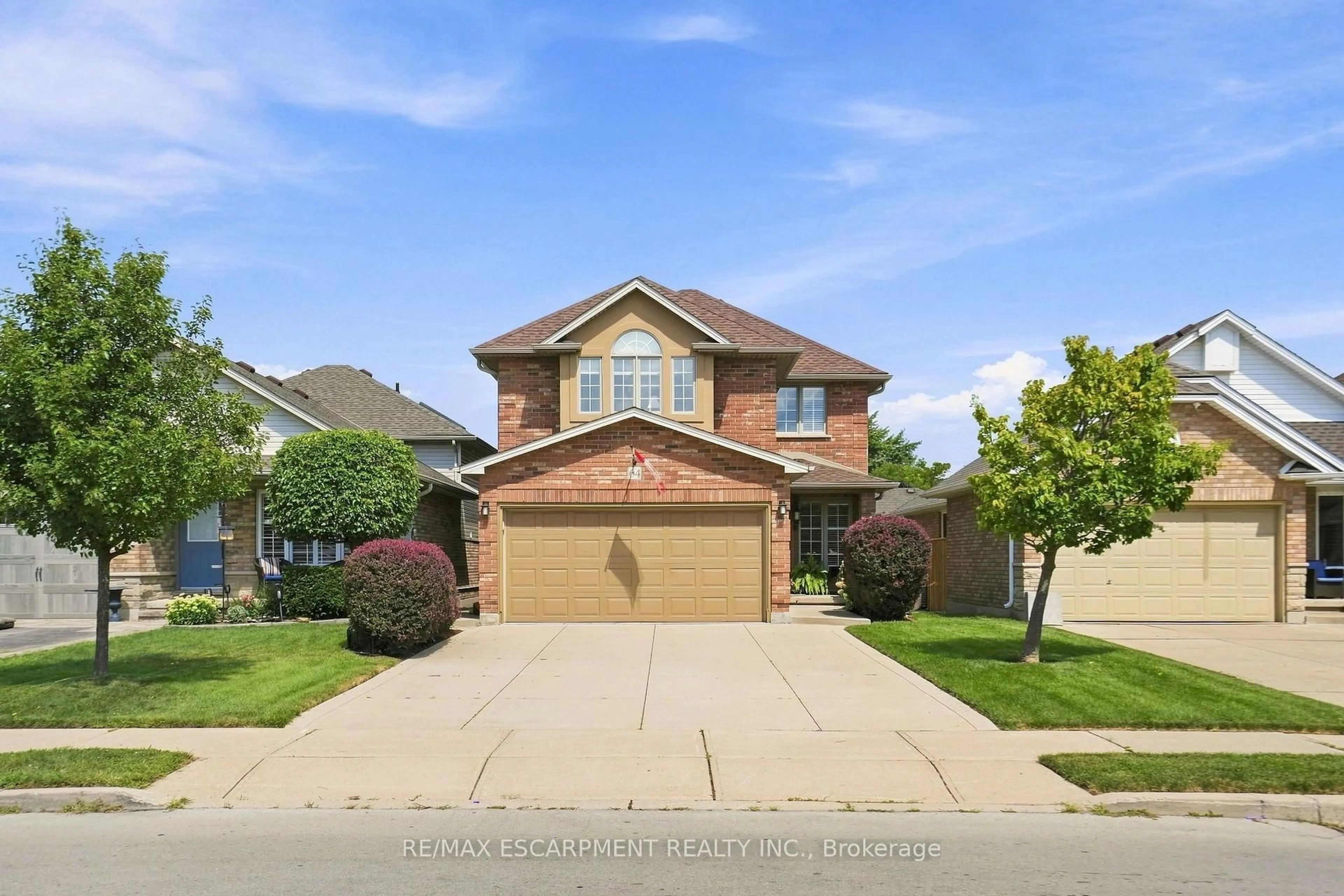 Home with brick exterior material, street for 64 Redfern Ave, Hamilton Ontario L9C 7S4