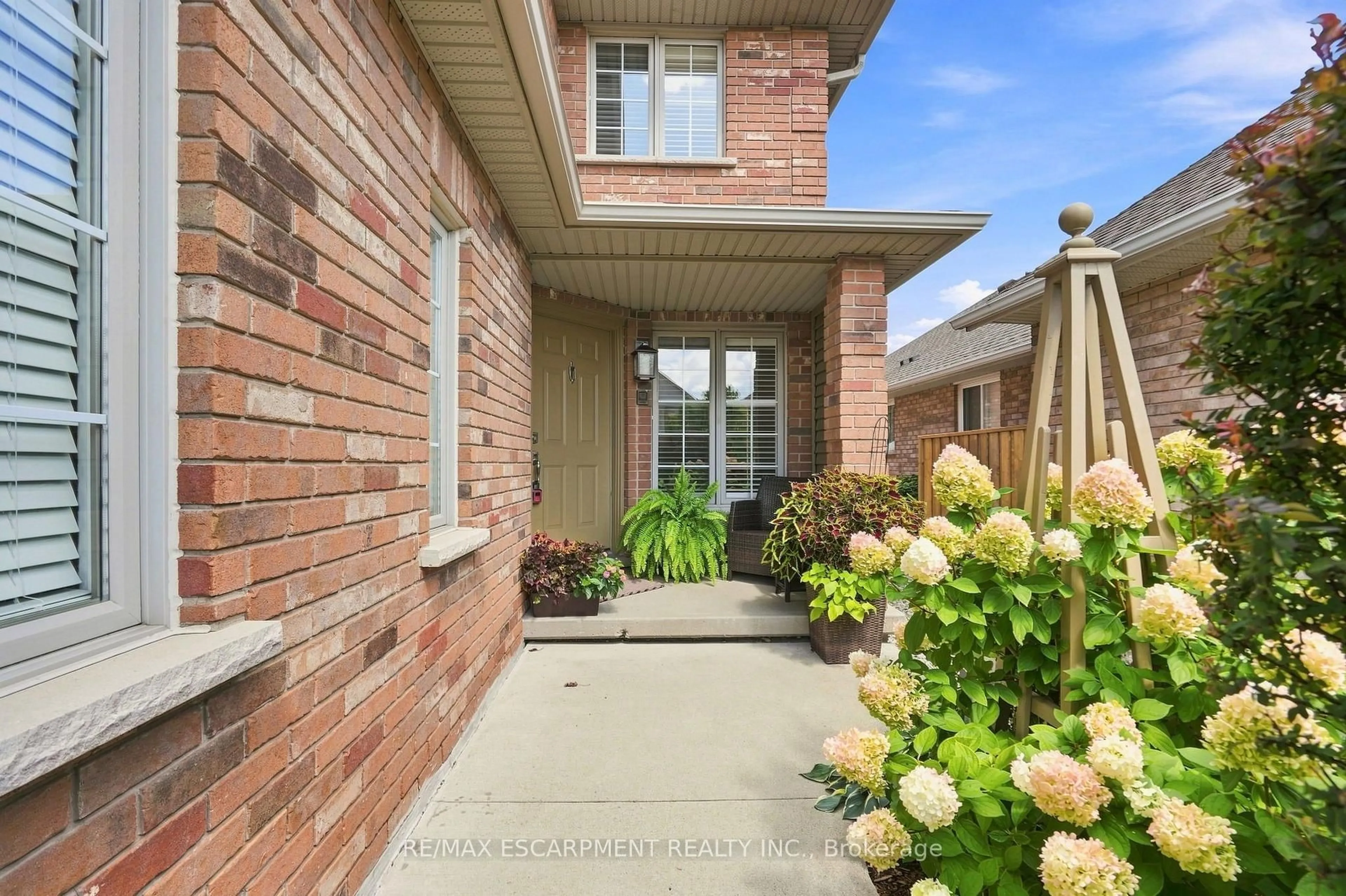 Home with brick exterior material, street for 64 Redfern Ave, Hamilton Ontario L9C 7S4