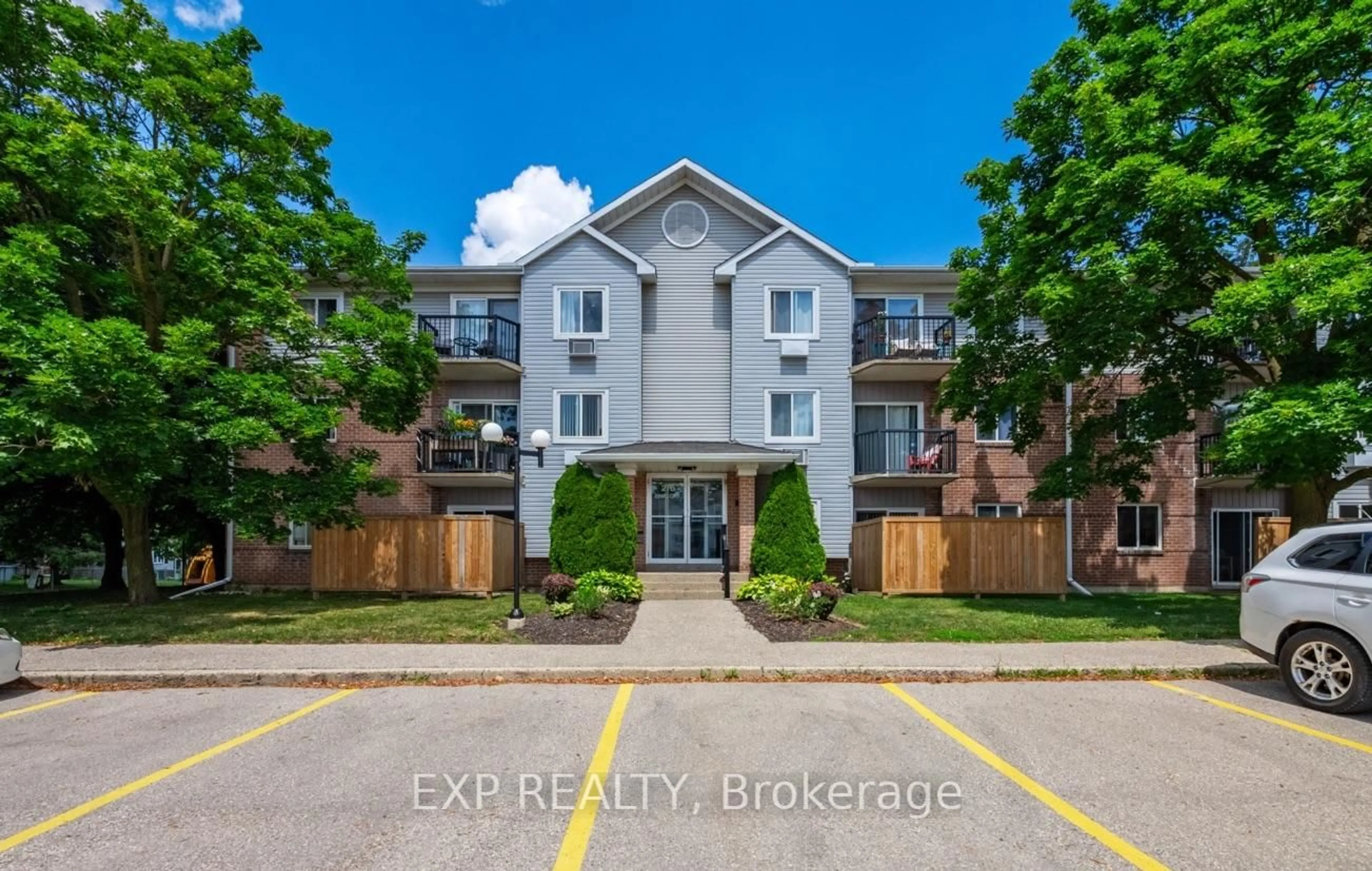A pic from outside/outdoor area/front of a property/back of a property/a pic from drone, building for 276 Eiwo Crt #301, Waterloo Ontario N2K 3M6