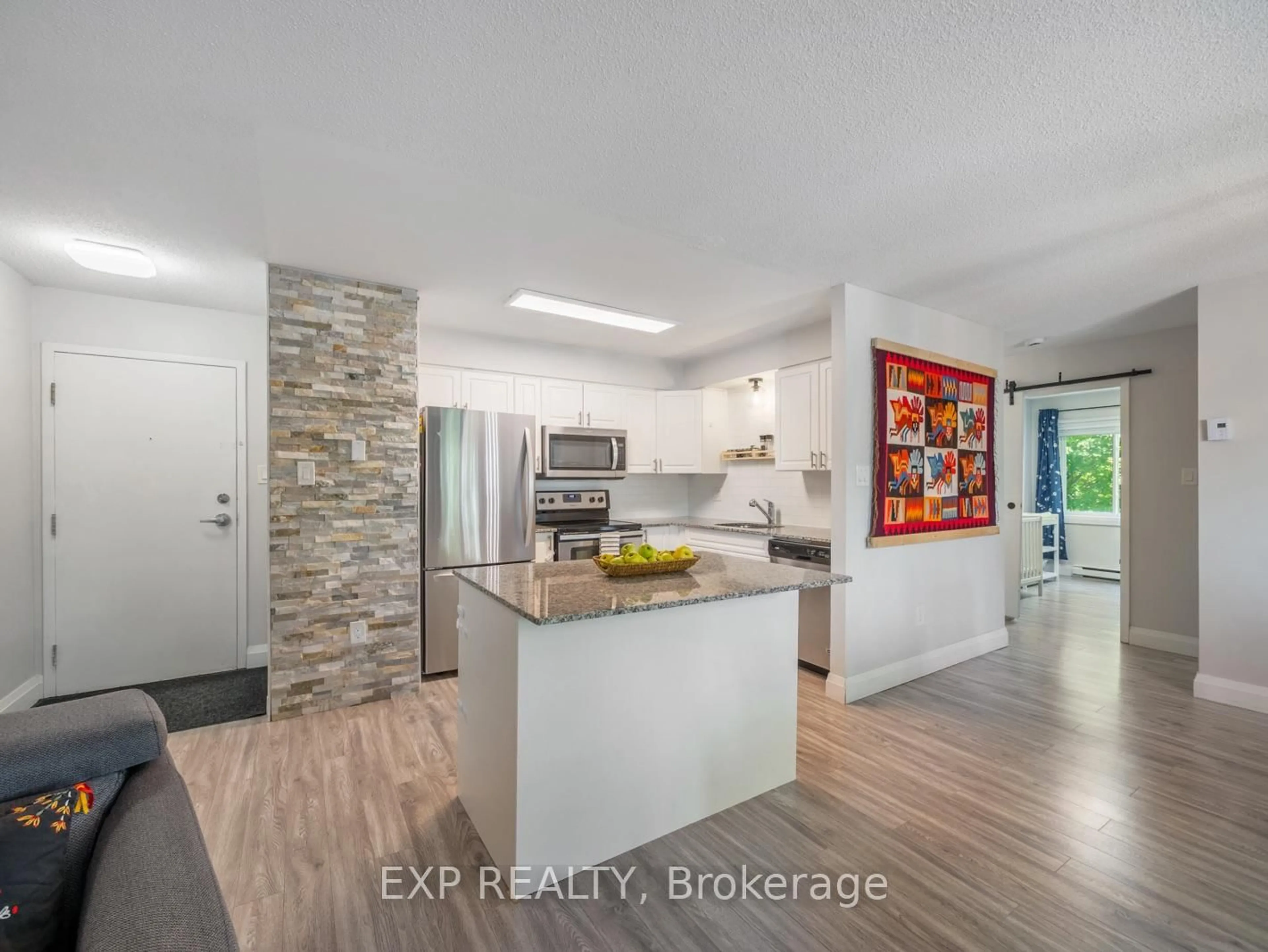 Open concept kitchen, ceramic/tile floor for 276 Eiwo Crt #301, Waterloo Ontario N2K 3M6