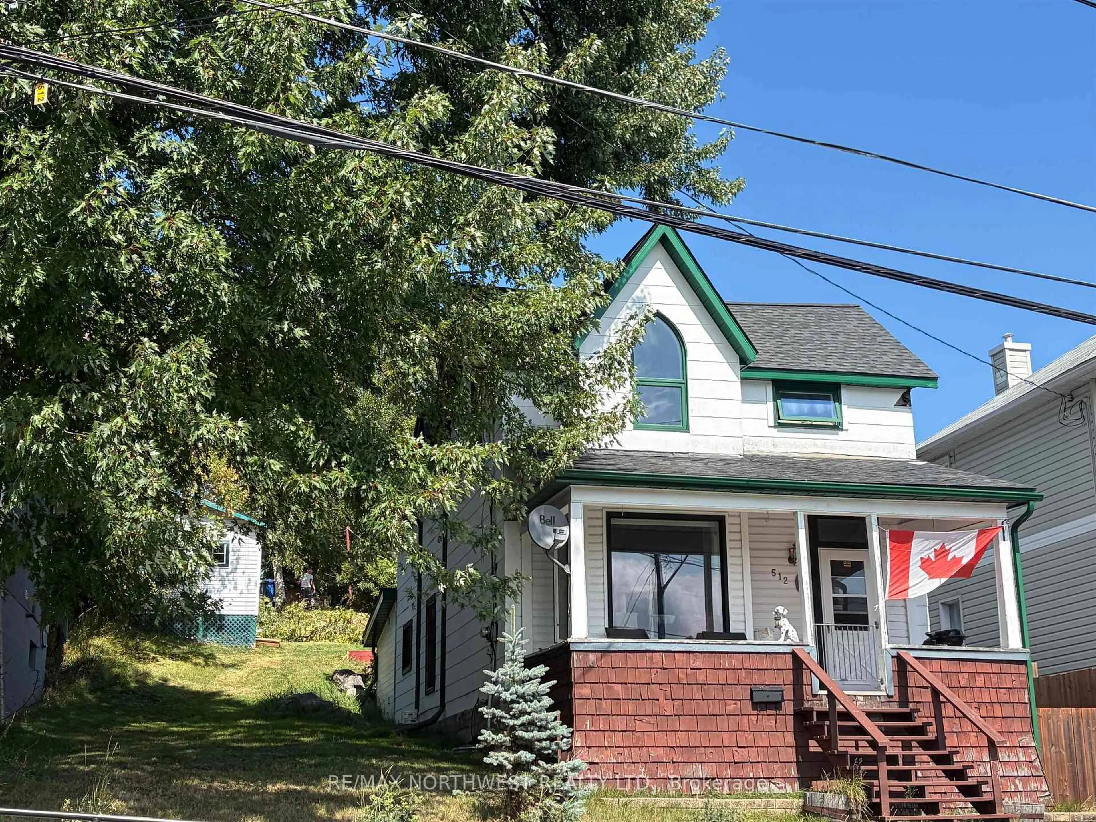 A pic from outside/outdoor area/front of a property/back of a property/a pic from drone, street for 512 Third Street South, Kenora Ontario P9N 1J3