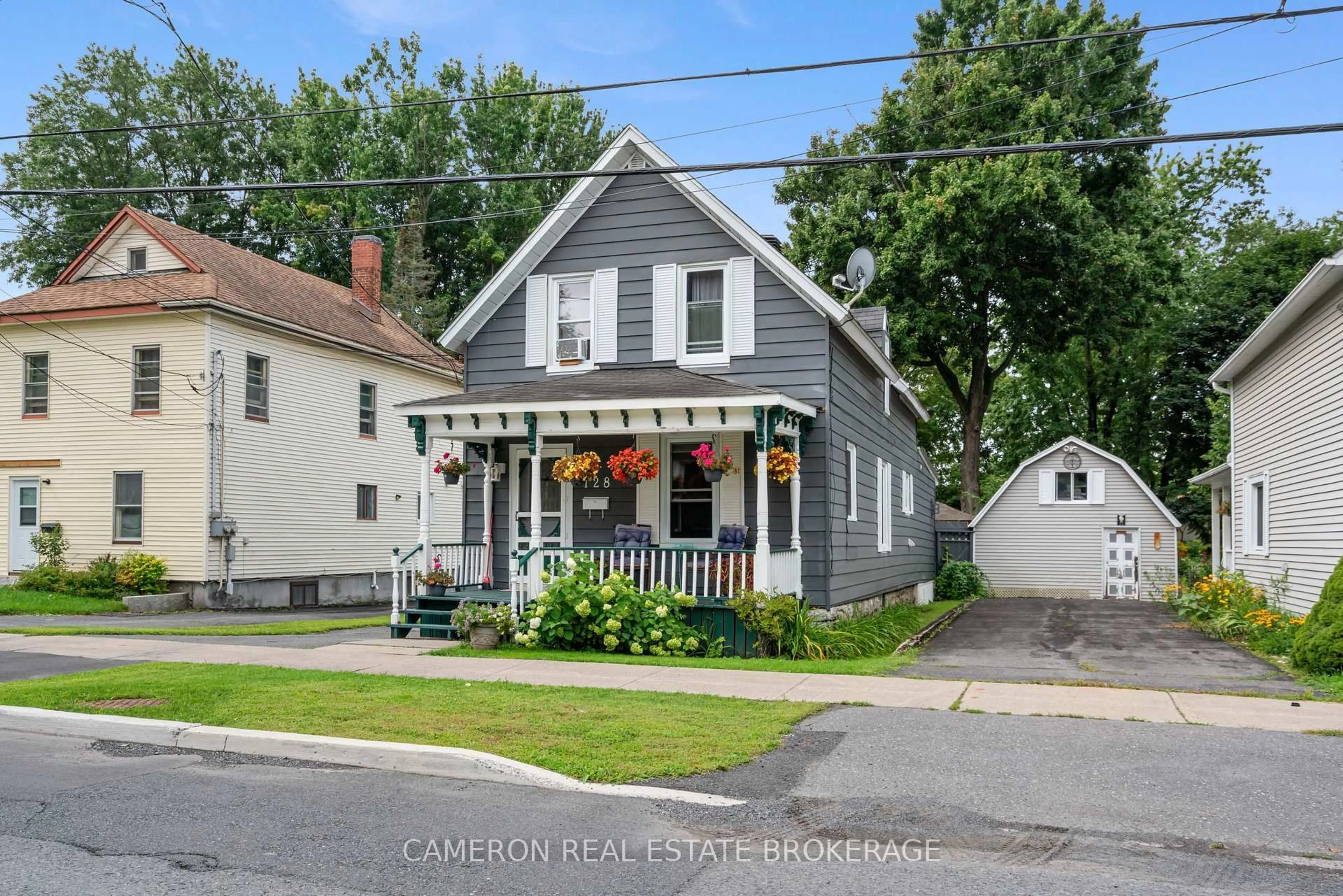 Home with vinyl exterior material, street for 128 Adolphus St, Cornwall Ontario K6H 3S3