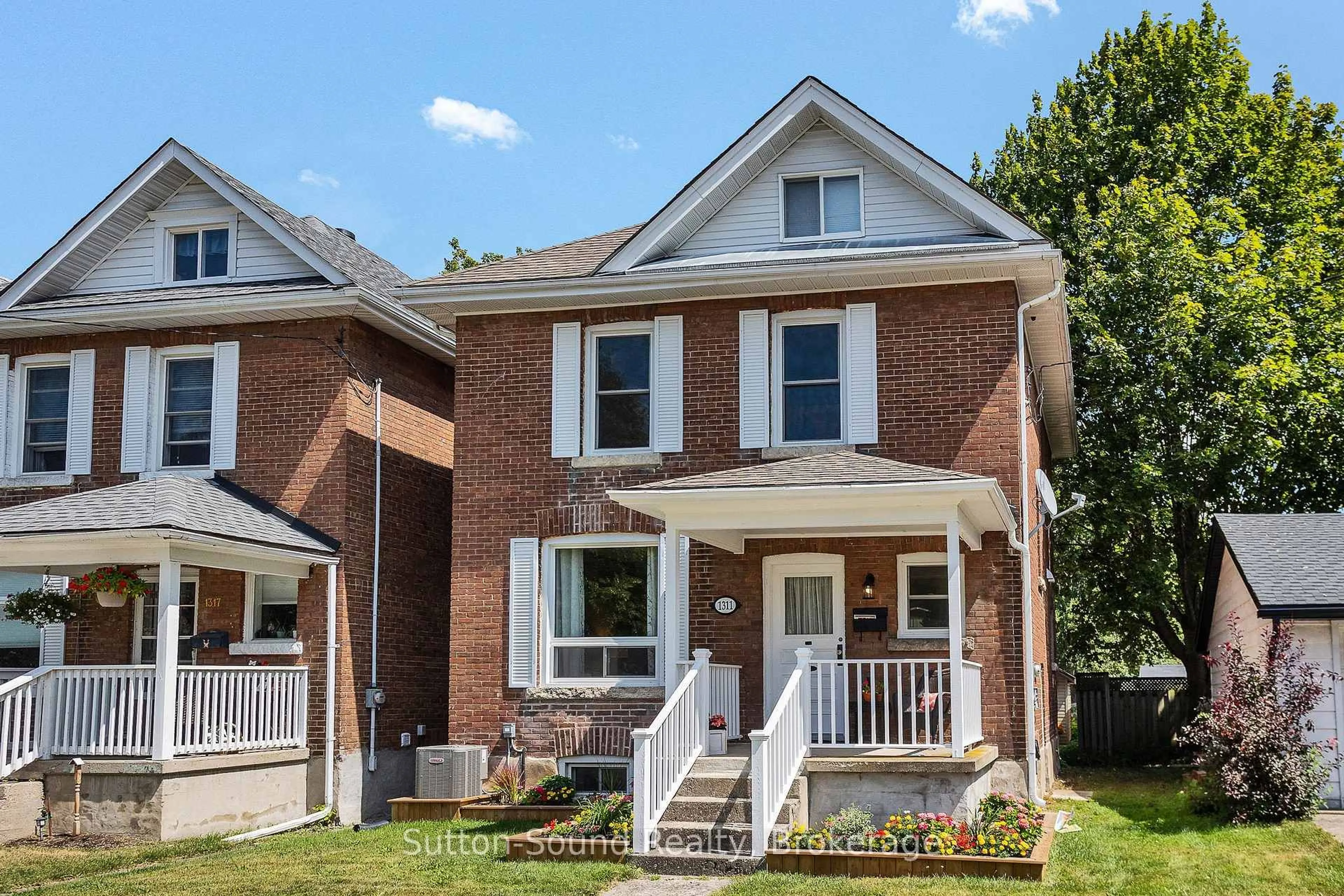 Home with brick exterior material, street for 1311 4th Ave West Ave, Owen Sound Ontario N4K 4W9
