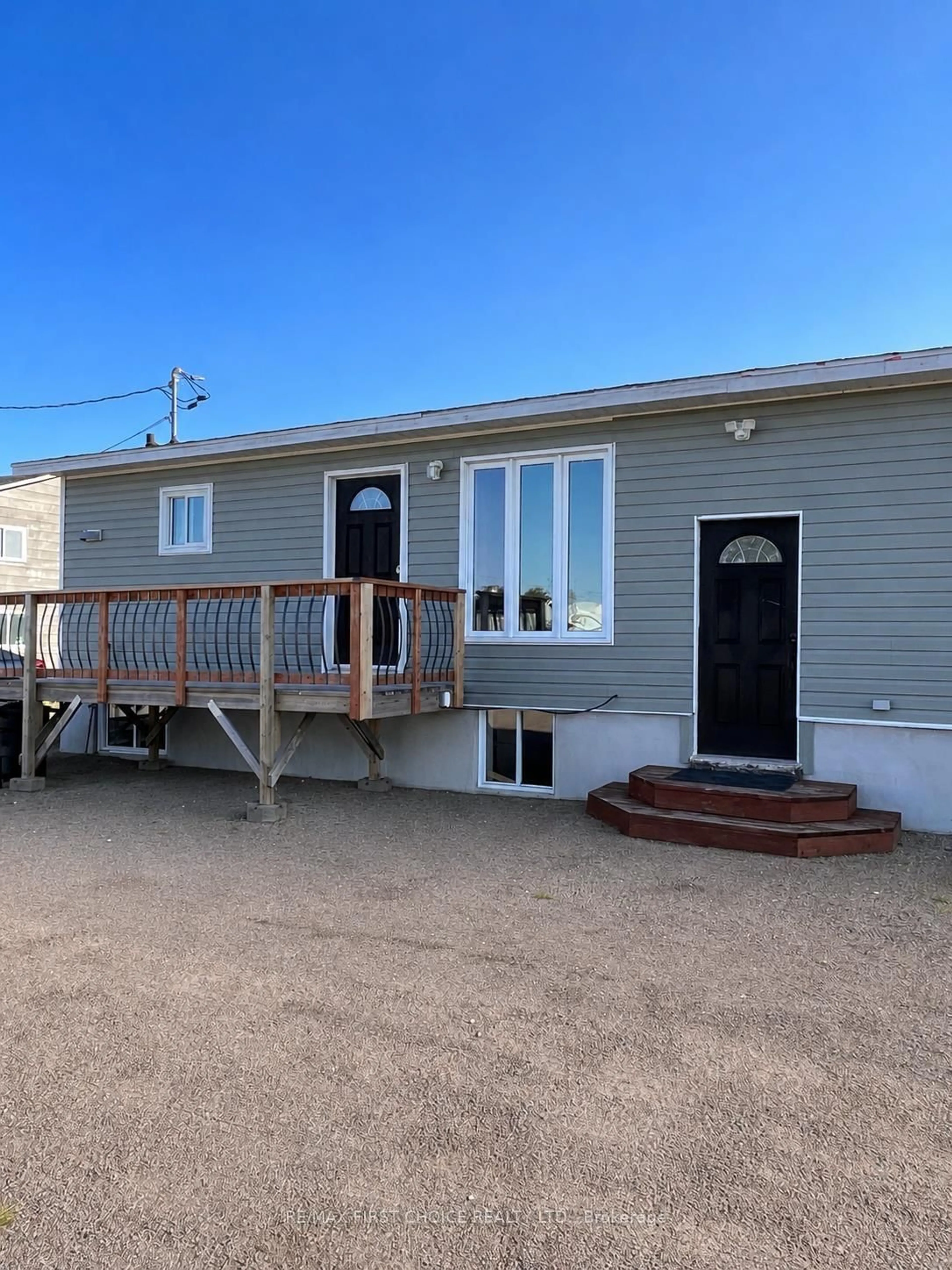 Home with vinyl exterior material, street for 118 Kenogami Rd, Greenstone Ontario P0T 2A0