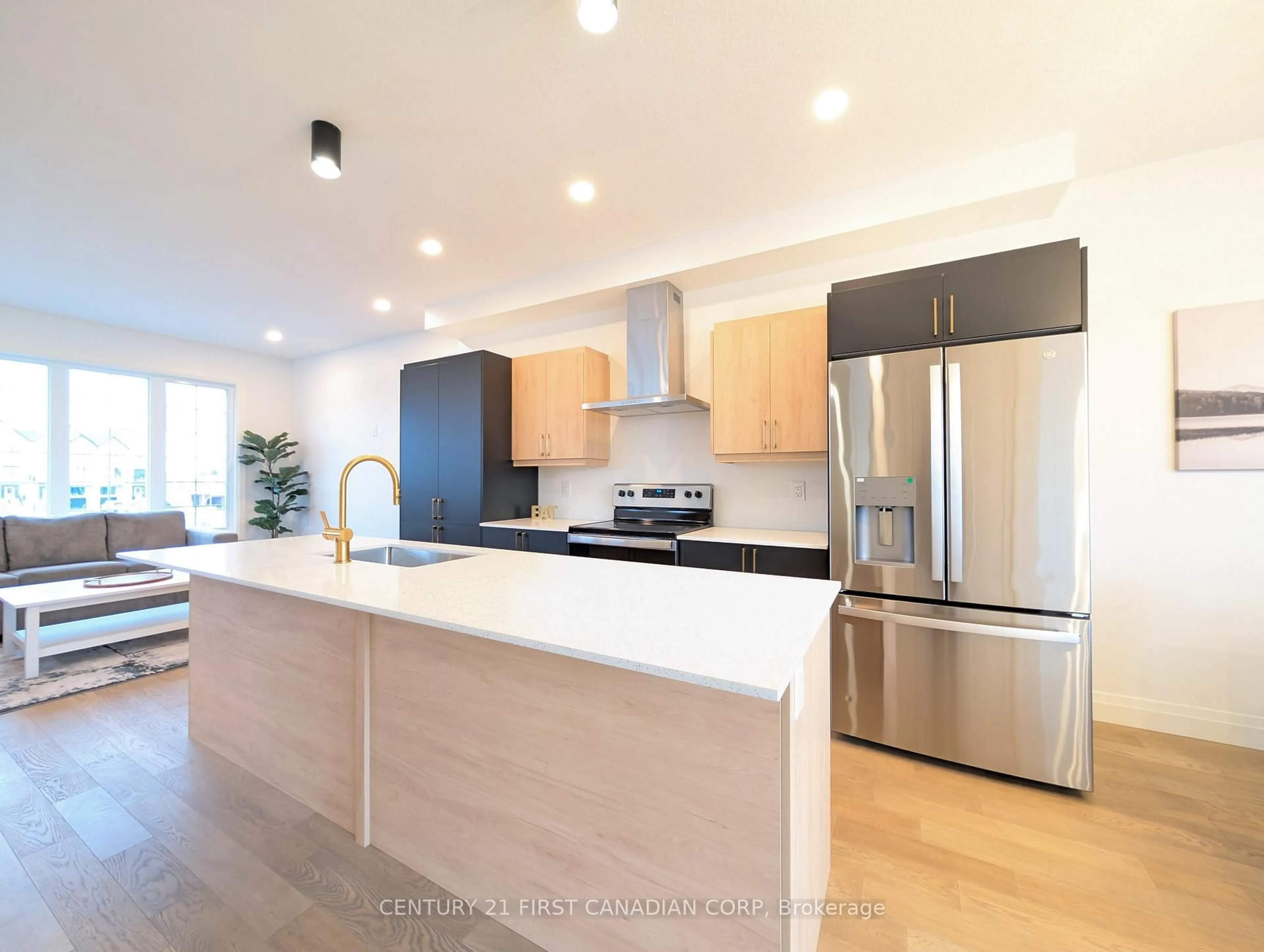 Open concept kitchen, wood/laminate floor for 235 Kennington Way #38, London South Ontario N6L 0J7