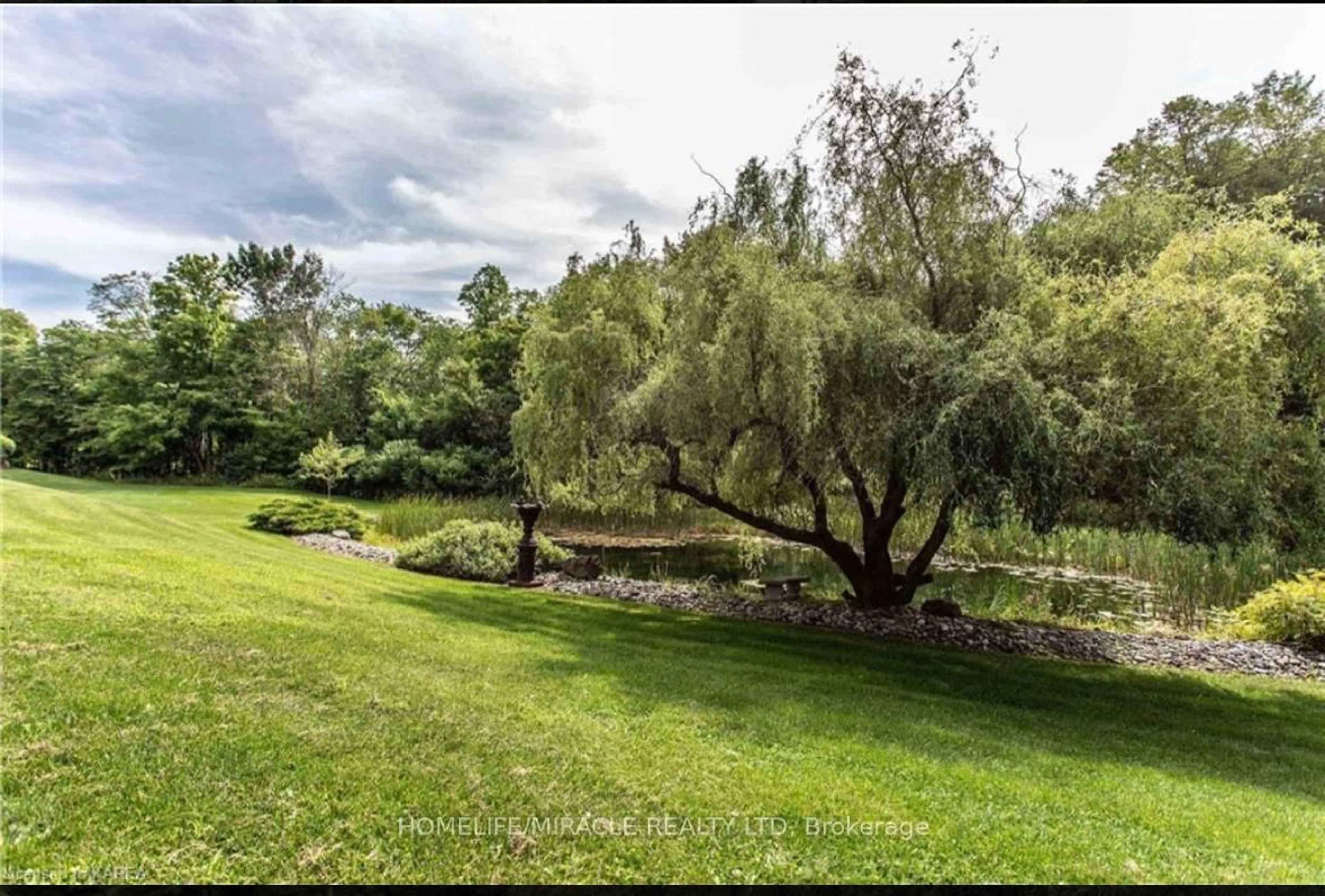 A pic from outside/outdoor area/front of a property/back of a property/a pic from drone, water/lake/river/ocean view for 13382 Highway 38 Highway, Sharbot Lake Ontario K0H 2P0