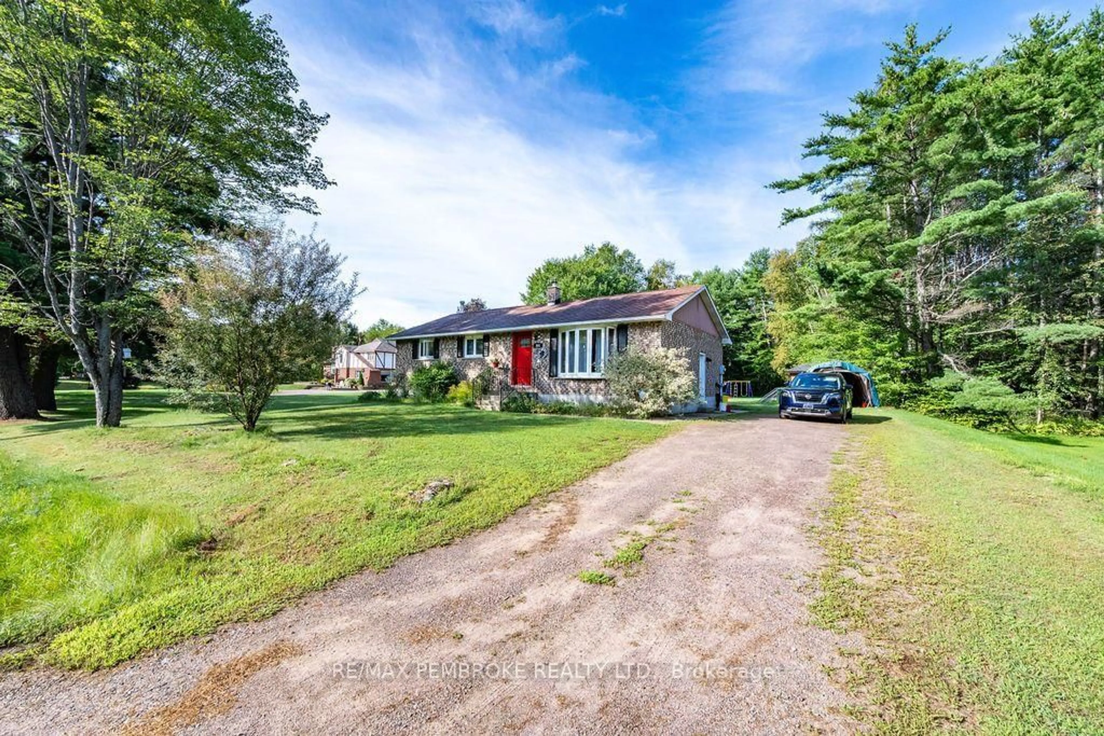 A pic from outside/outdoor area/front of a property/back of a property/a pic from drone, street for 393 Biggs Rd, Petawawa Ontario K8A 6W7