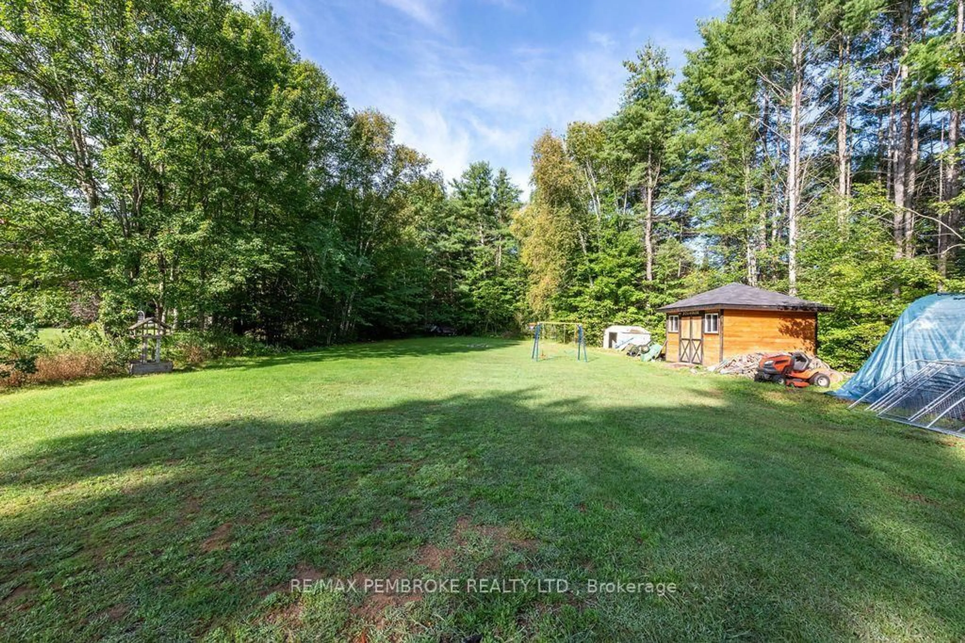A pic from outside/outdoor area/front of a property/back of a property/a pic from drone, forest/trees view for 393 Biggs Rd, Petawawa Ontario K8A 6W7